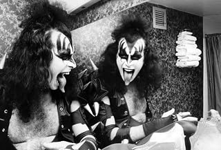 Gene Simmons sticking out his tongue by a bathroom mirror Photo Print (30 x 24)