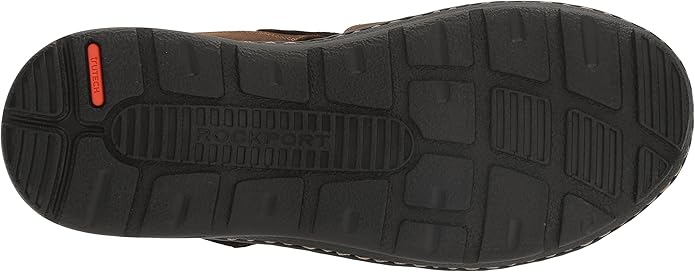 Rockport Men's Darwyn Fisherman sandals are a versatile and practical footwear choice for men. These sandals feature a leather upper with a closed toe design, making them suitable for a variety of outdoor activities. The adjustable hook-and-loop strap allows for a customized and secure fit, while the cushioned footbed provides all-day comfort and support.

The Darwyn Fisherman sandals also include a moisture-wicking lining to keep feet dry and comfortable, as well as a flexible rubber outsole for traction on different surfaces. With their classic design and reliable construction, these sandals are a great option for casual wear, beach days, or summer outings. Overall, Rockport Men's Darwyn Fisherman sandals are a stylish and comfortable choice for men looking for reliable and versatile footwear. Description by ChatGPT.