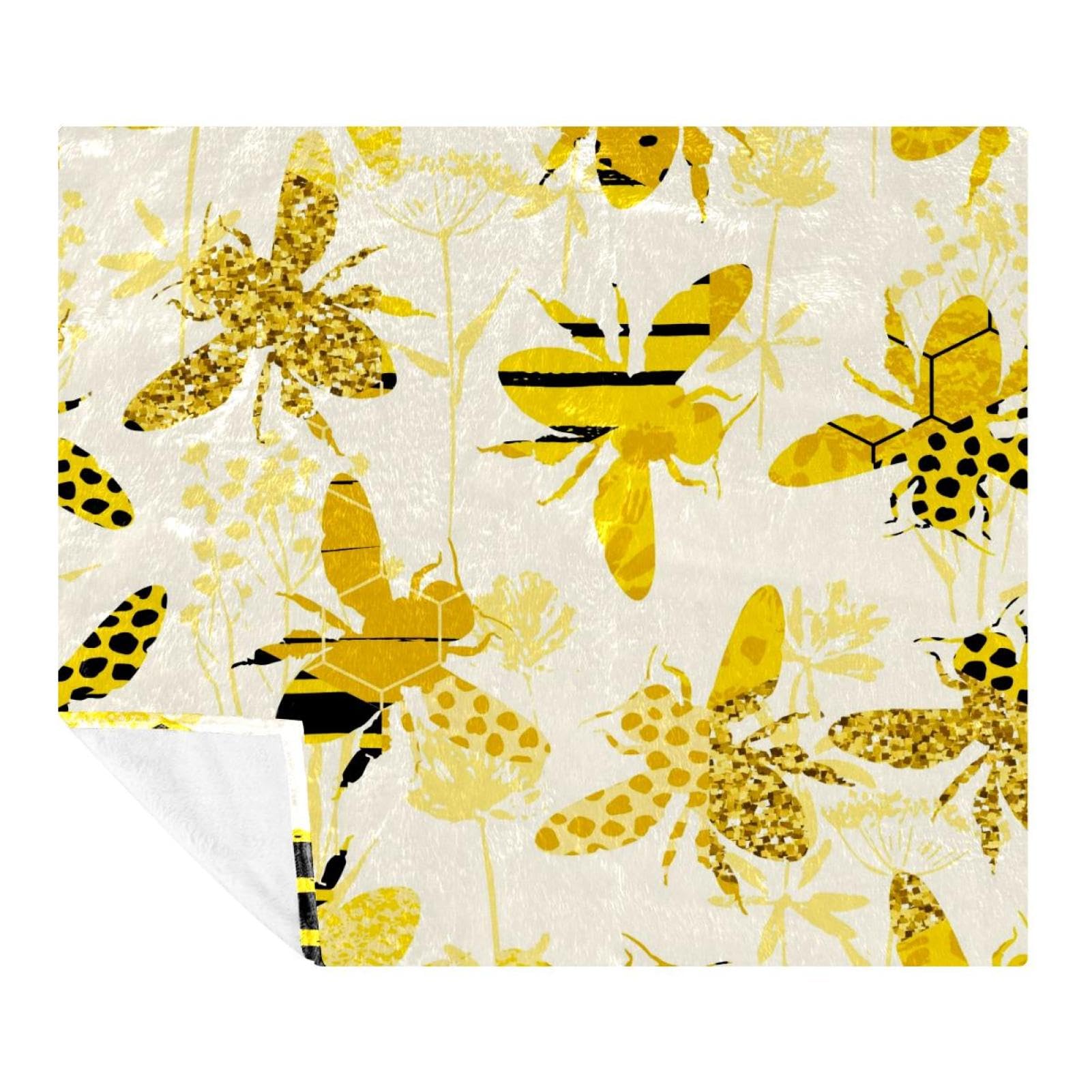 Couverture microfibre abeille pour des moments cocooning sur le canapé