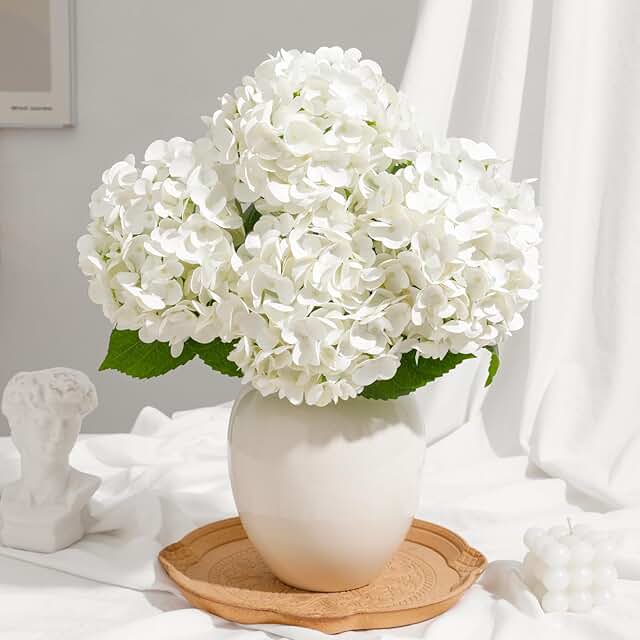 Four white artificial hydrangeas with long bendable stems