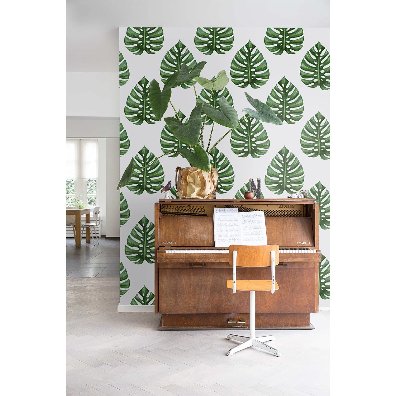 Papier peint monstera décoration murale exotique pour salon chic