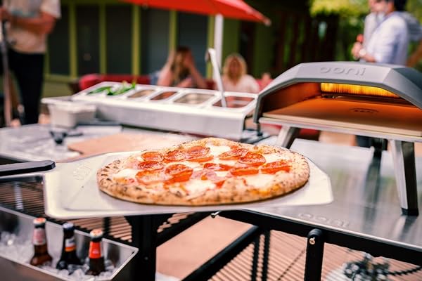 Ooni Pelle a Pizza Perforée 30 cm – Pelle Pizza Légère en Aluminium Anodisé pour Four à Pizza – Compatible avec Tous les Fours Manche Résistant à la Chaleur - 4
