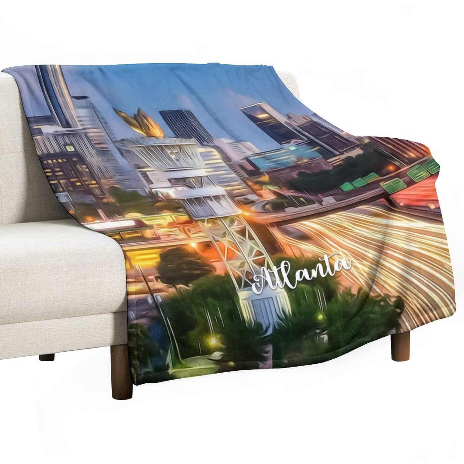 Couverture duveteuse Atlanta pour un hiver cocooning au canapé