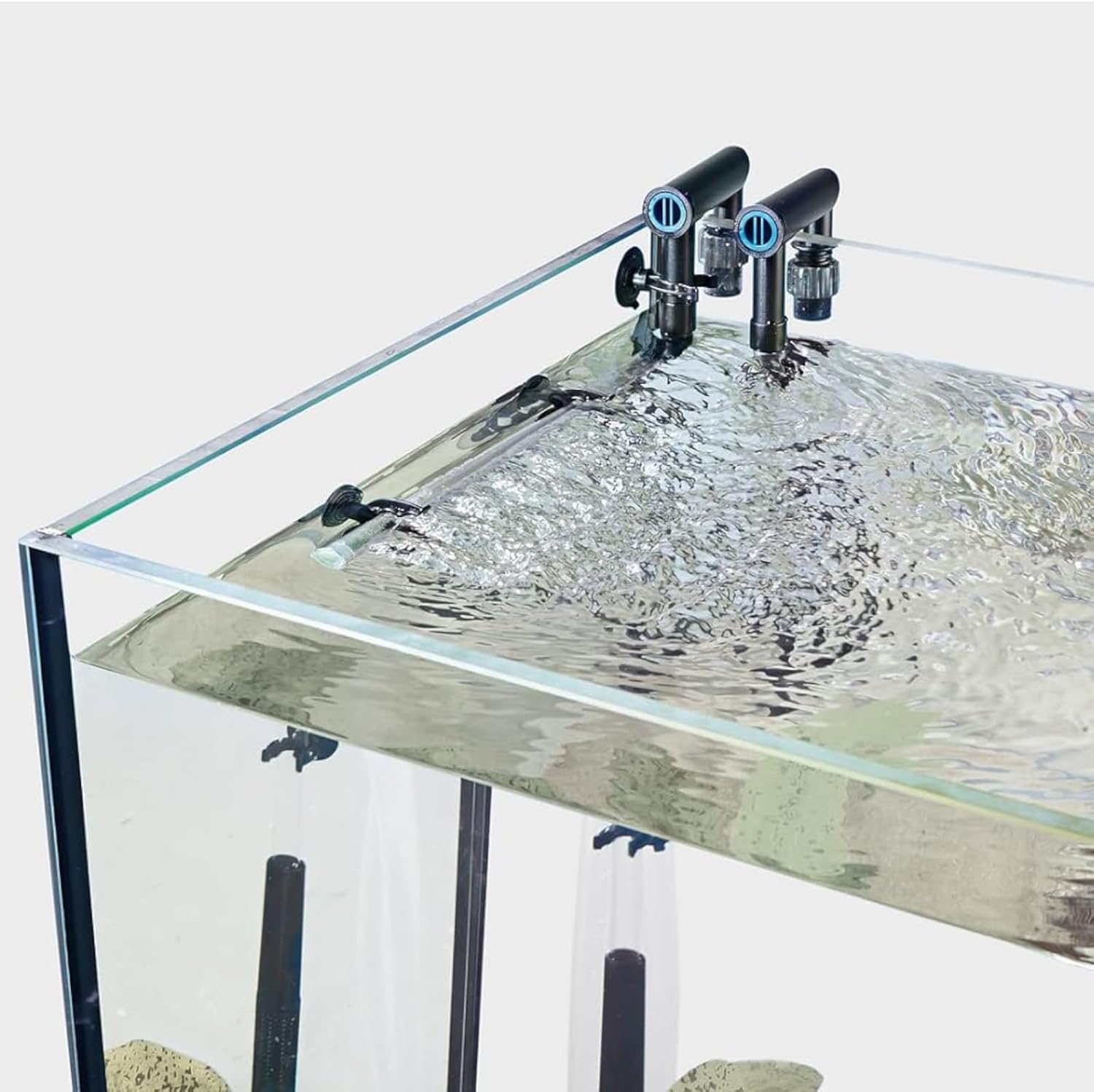 OASE FiltoSmart 100 filter operating with water flowing into an aquarium