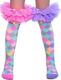 جليتر فريلز - تألق مع جوارب بطول الركبة تتميز بكشكشة مغطاة بالجليتر ترقص مع كل خطوة، مما يوفر دفقة مرحة من التألق الذي يرفع المظهر الكاجوال إلى مظهر جذاب.