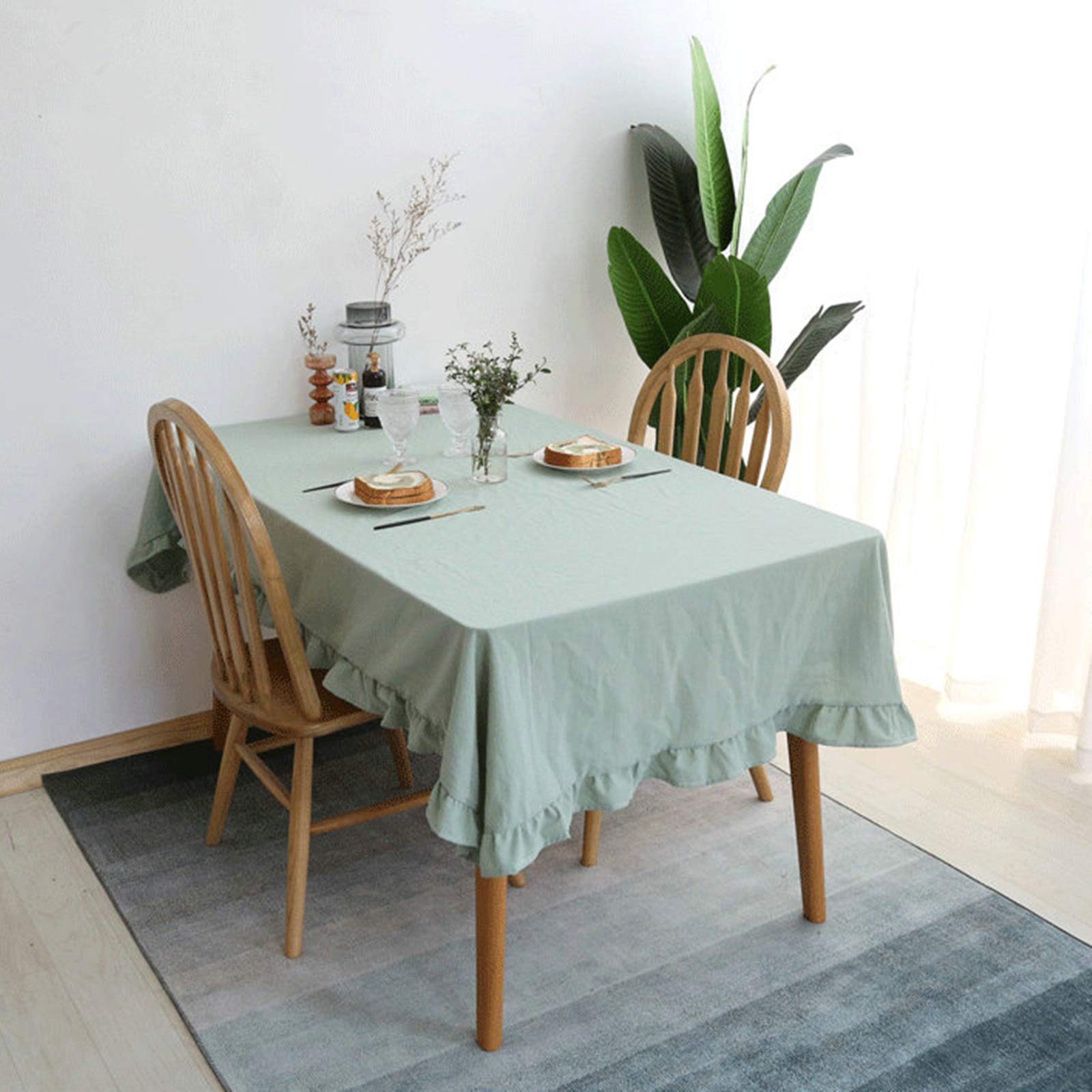 Couverture moderne coton vert clair 100x160cm au design minimaliste pour intérieur épuré