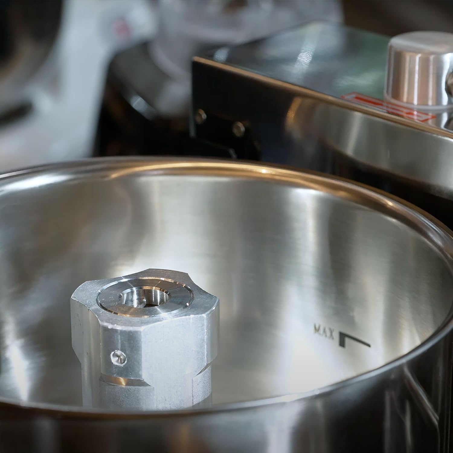 Inside view of the GGM Gastro CUH12N processing bowl with the blade attachment point.
