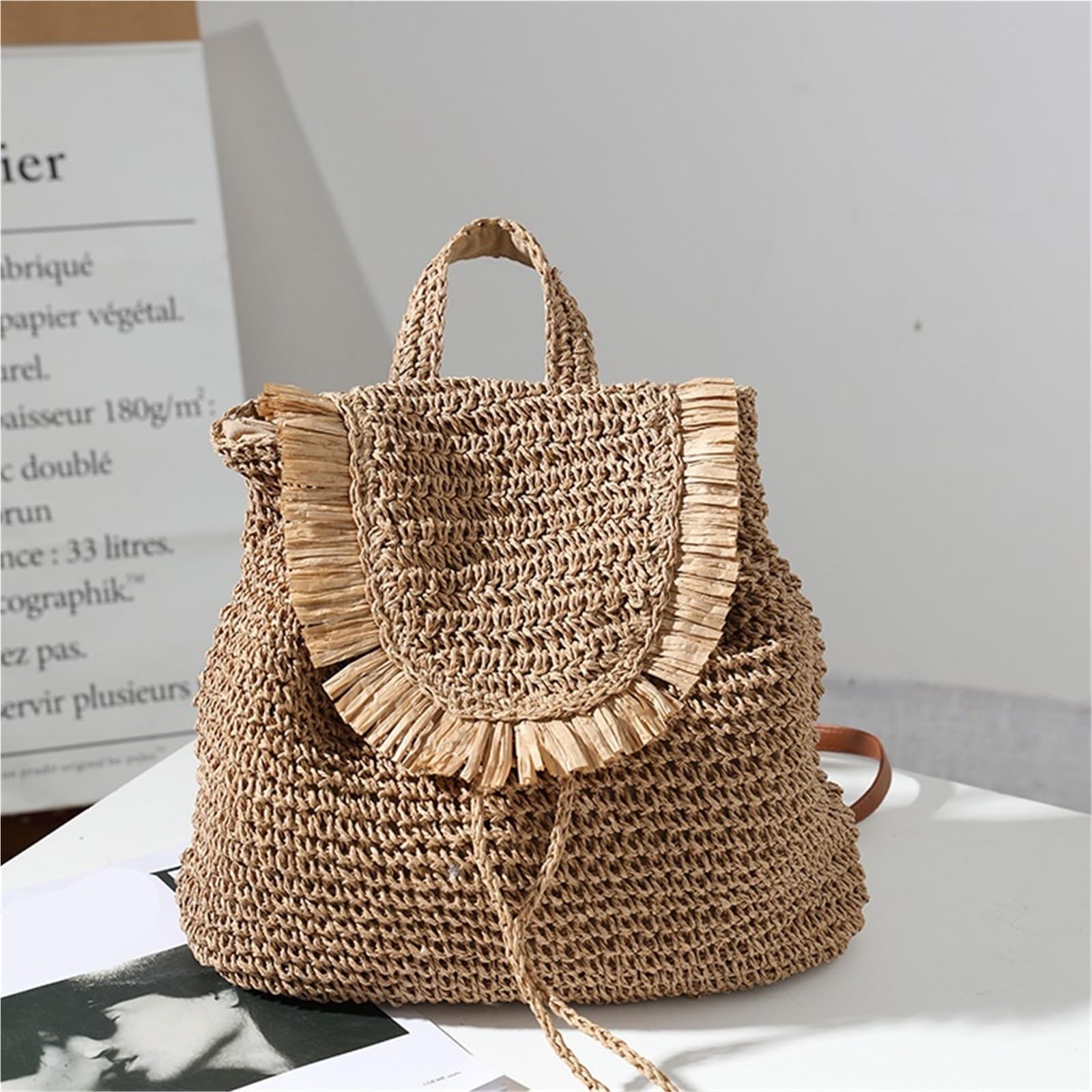 Zaino for il tempo libero con nappe intrecciate in paglia. Vacanza al mare