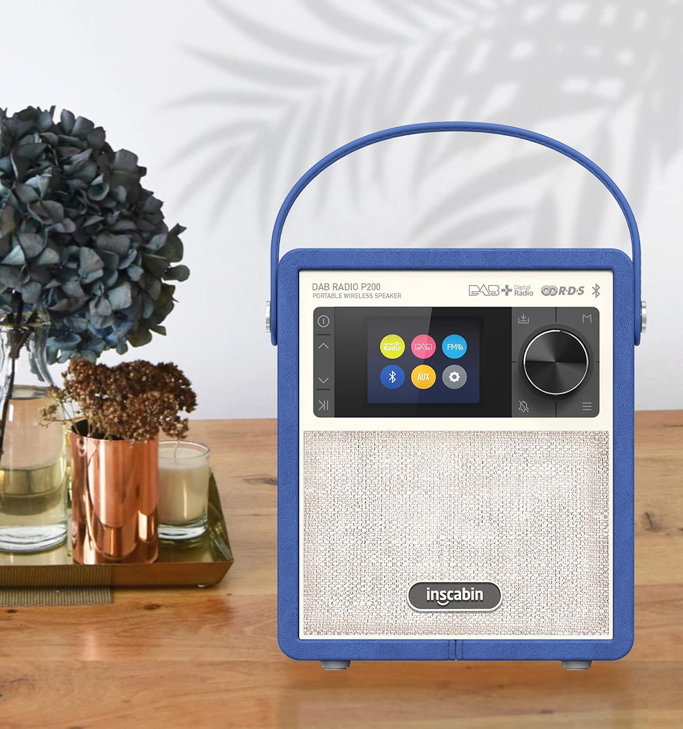 Inscabin P200 Portable DAB/DAB+ FM Digital Radio on a wooden table, showcasing its vintage design.