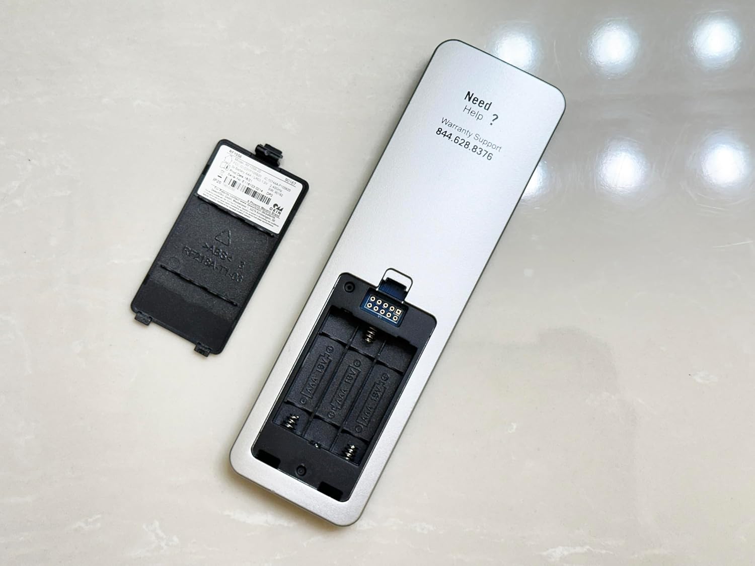 Front of the RF1058-20 remote control showing all function buttons and the Mattress Firm logo.