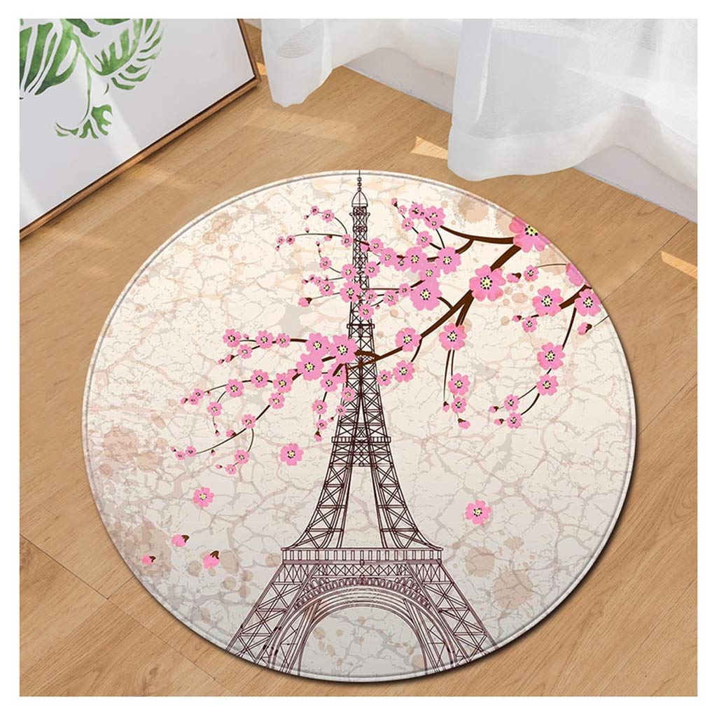 Tapis de salon rond à motif spirale pour créer un coin lecture cosy