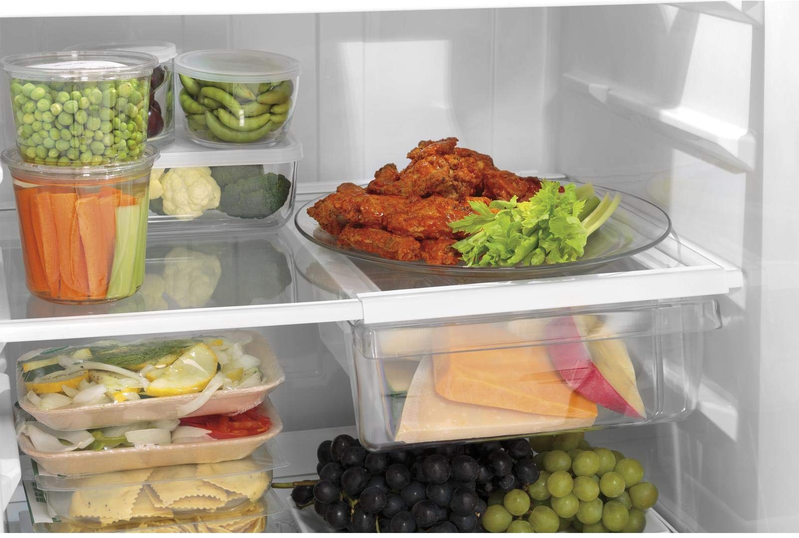 GE Gte18dtnrww 28" Energy Star Qualified Top Freezer Refrigerator With 17.52 Cu. Ft. Capacity, LED Lighting, Adjustable Wire Shelves And Upfront Temperature Controls In White on Fridge.com - View 5