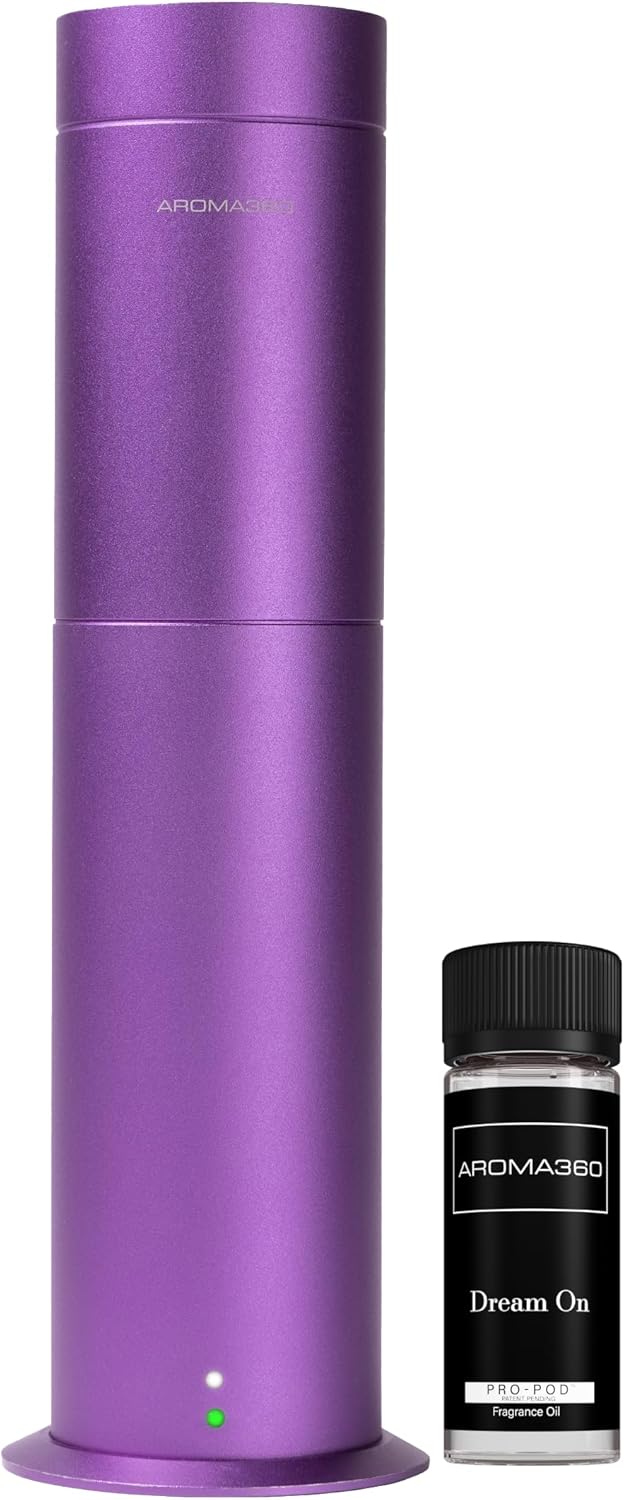 Aroma360 Mini Pro Scent Diffuser in purple next to a small black bottle of Aroma360 Dream On Pro Pod fragrance oil.