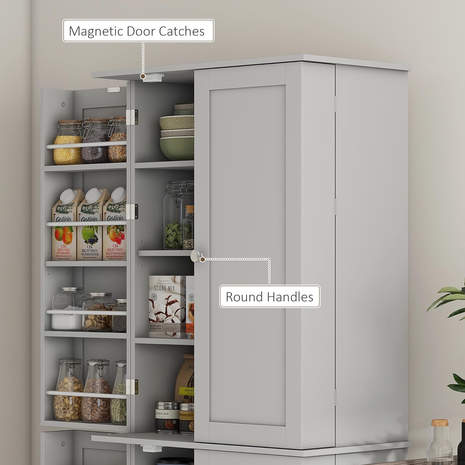 Close-up image of the cabinet door showing the magnetic door catches and round handles.