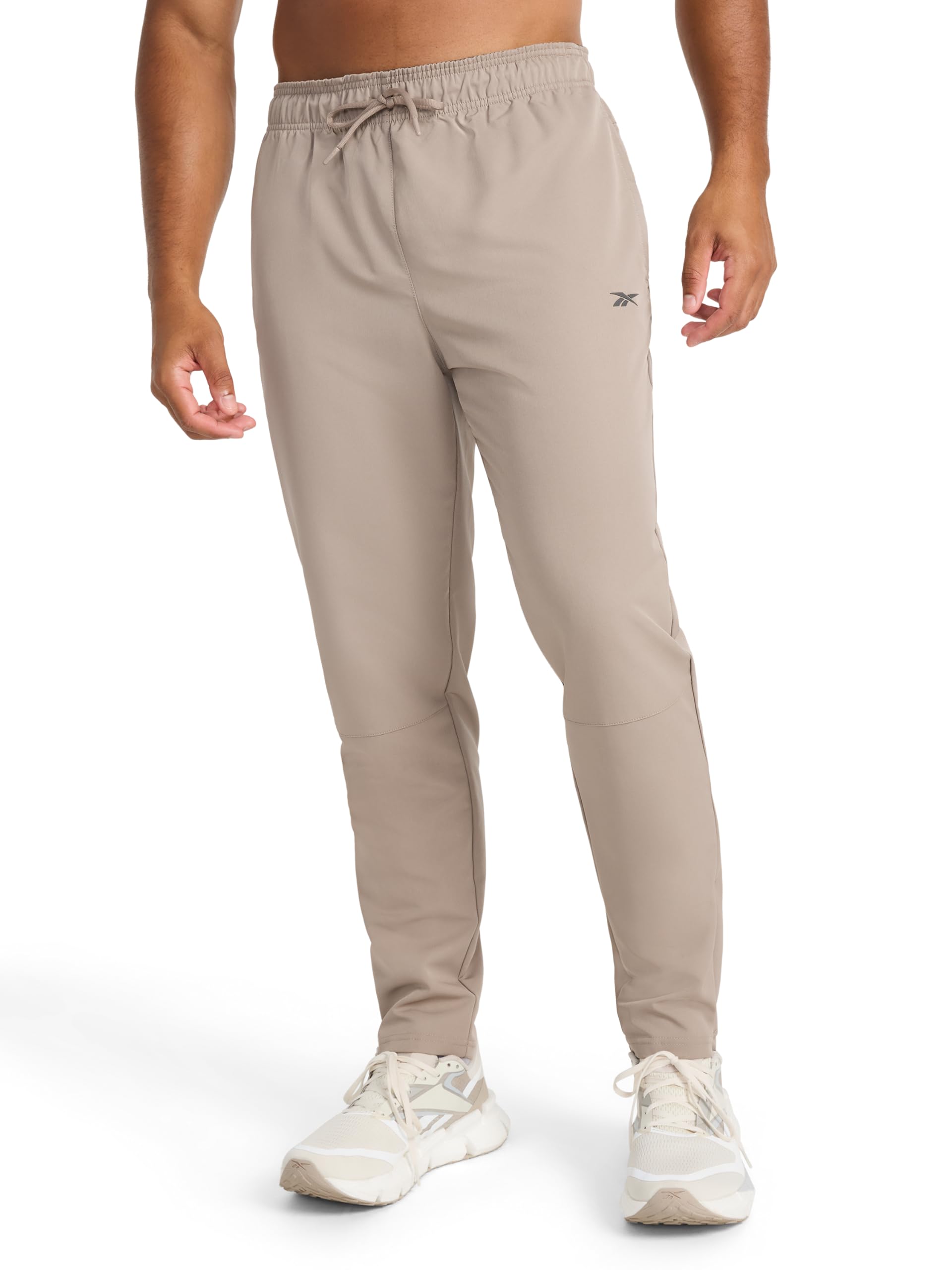 Reebok Apparel Men's Dominator Pant, Standard Fit, 30” Inseam, Lightweight Stretch Poly Fabric, Driftwood, Large