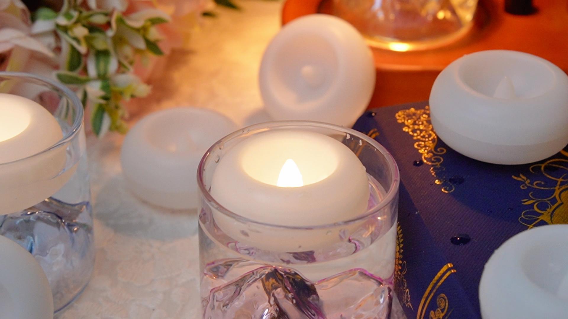 Image of 100 2-inch Floating Candles, Water Activated Flameless Tea Light | Battery Operated Waterproof Warm White LED Lights for Wedding Decorations, Pool Decor, Vase Fillers, and Party