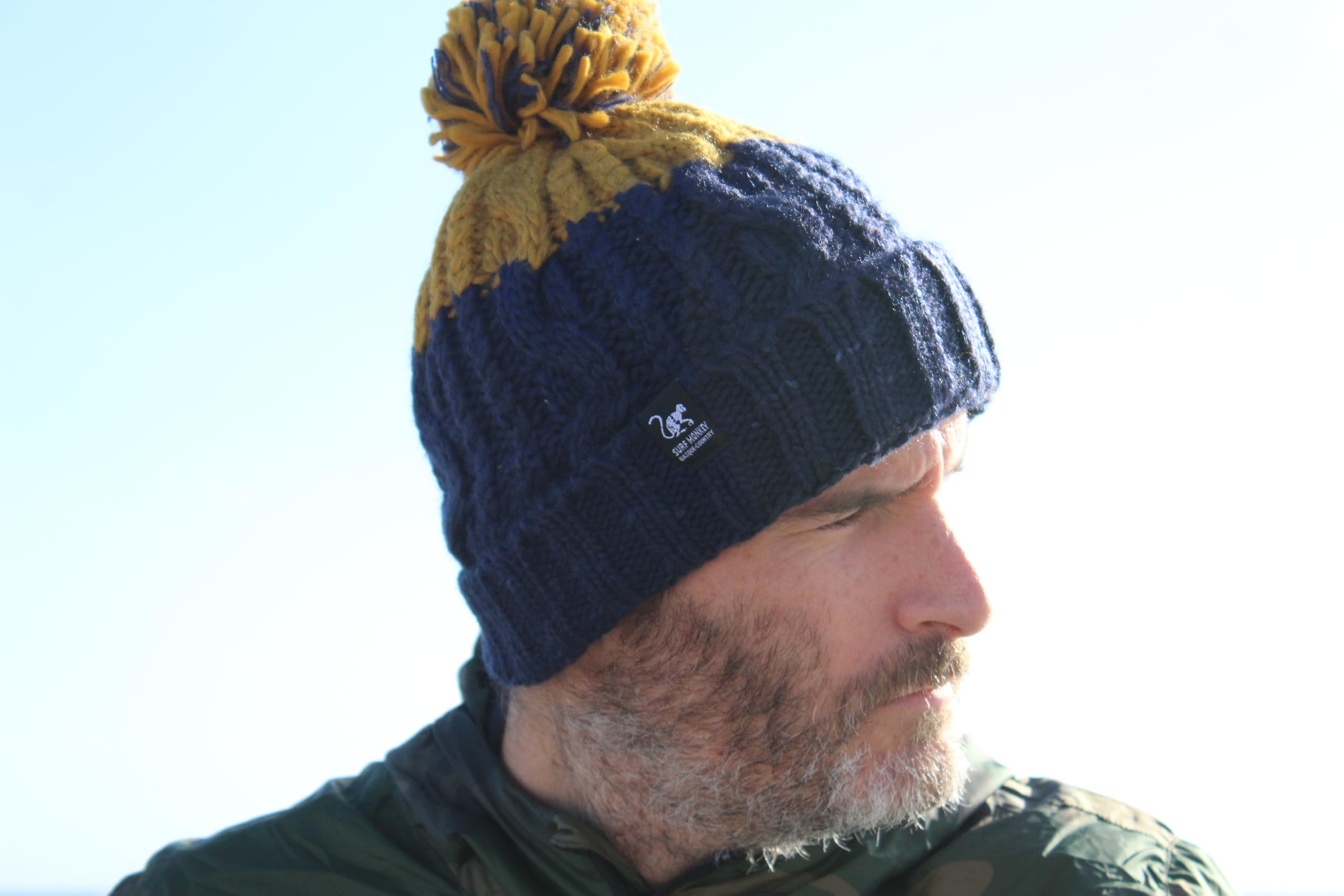 Surf Monkey Bonnet d'hiver unisexe avec pompon, taille unique, doublure polaire intérieure