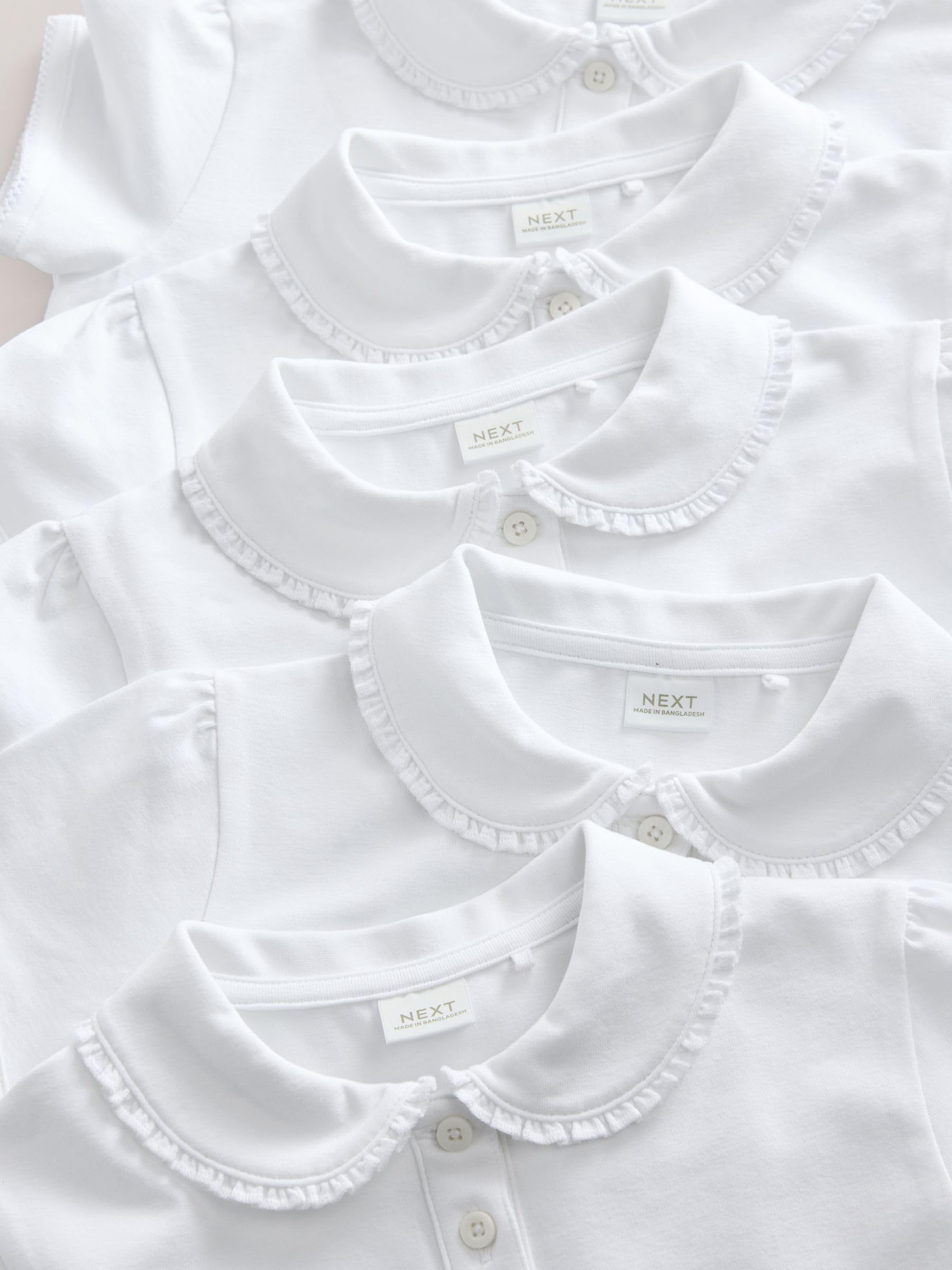 NEXT Mädchen Polo-Oberteile mit Rüschenkragen aus Baumwollstretch, 5er-Pack