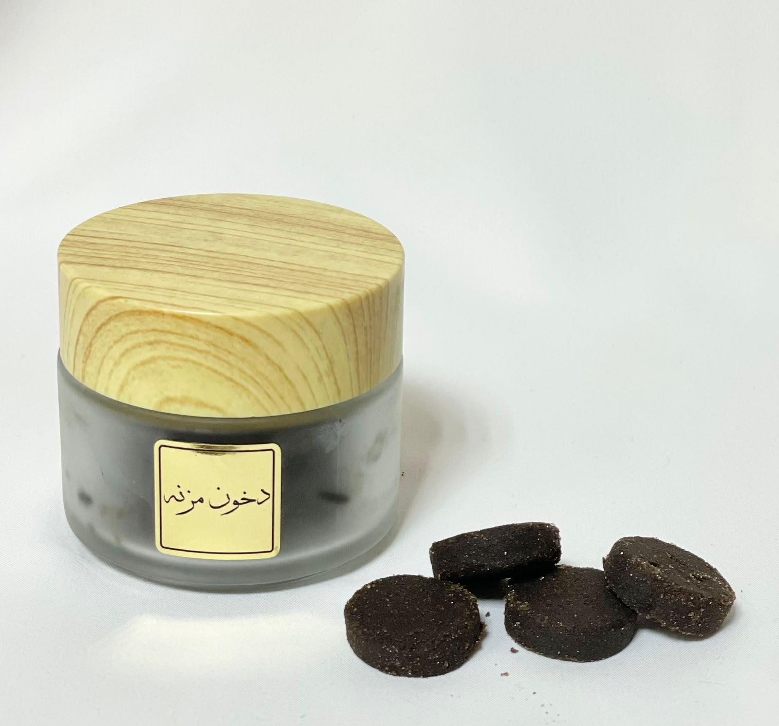 "Dukhon Muzna Bakhoor - Elevate your space with 25g of Exquisite Aromatic Bliss, a fragrant journey to enrich your surroundings." By Shah Perfumes