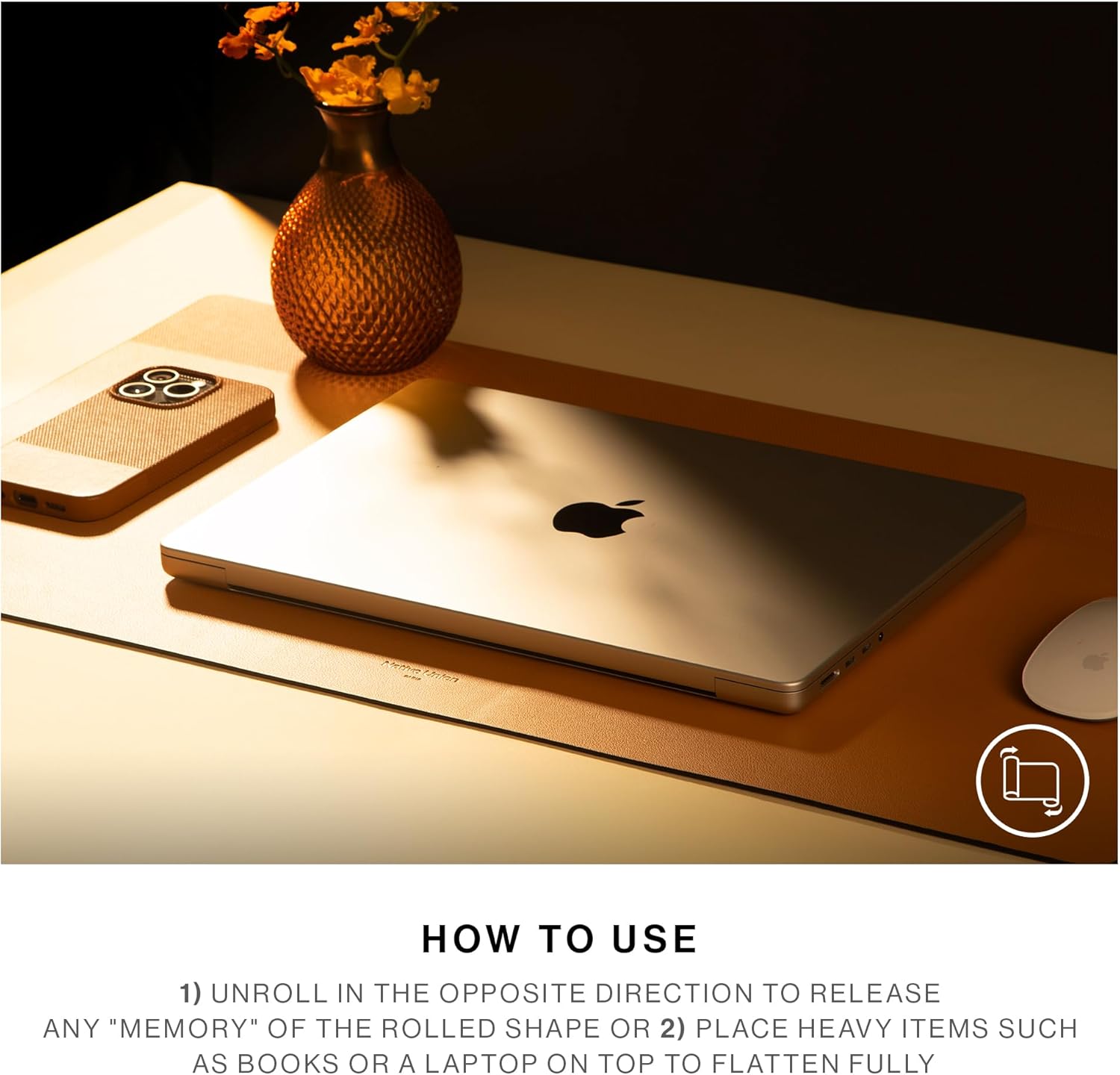 Instructions on how to flatten the Native Union Desk Mat using heavy objects
