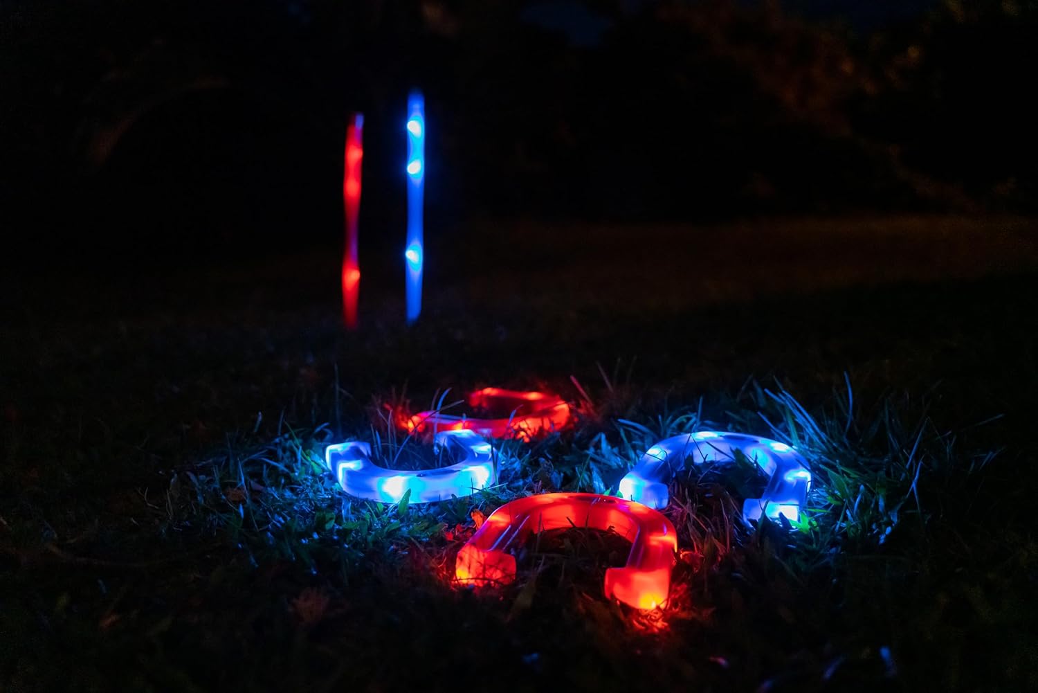 YARDCANDY After Dark Illuminated Horseshoes - Complete with 2 Weighted Blue LED Horseshoes, 2 Weighted Red LED Horseshoes and 2 LED Stakes. Perfect for Play Both Day or Night.