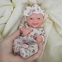 Boneca Bebê Reborn de Silicone Sólido Menina Macio 20cm Olhos Azuis