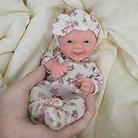 Boneca Bebê Reborn de Silicone Sólido Menina Macio 20cm Olhos Azuis
