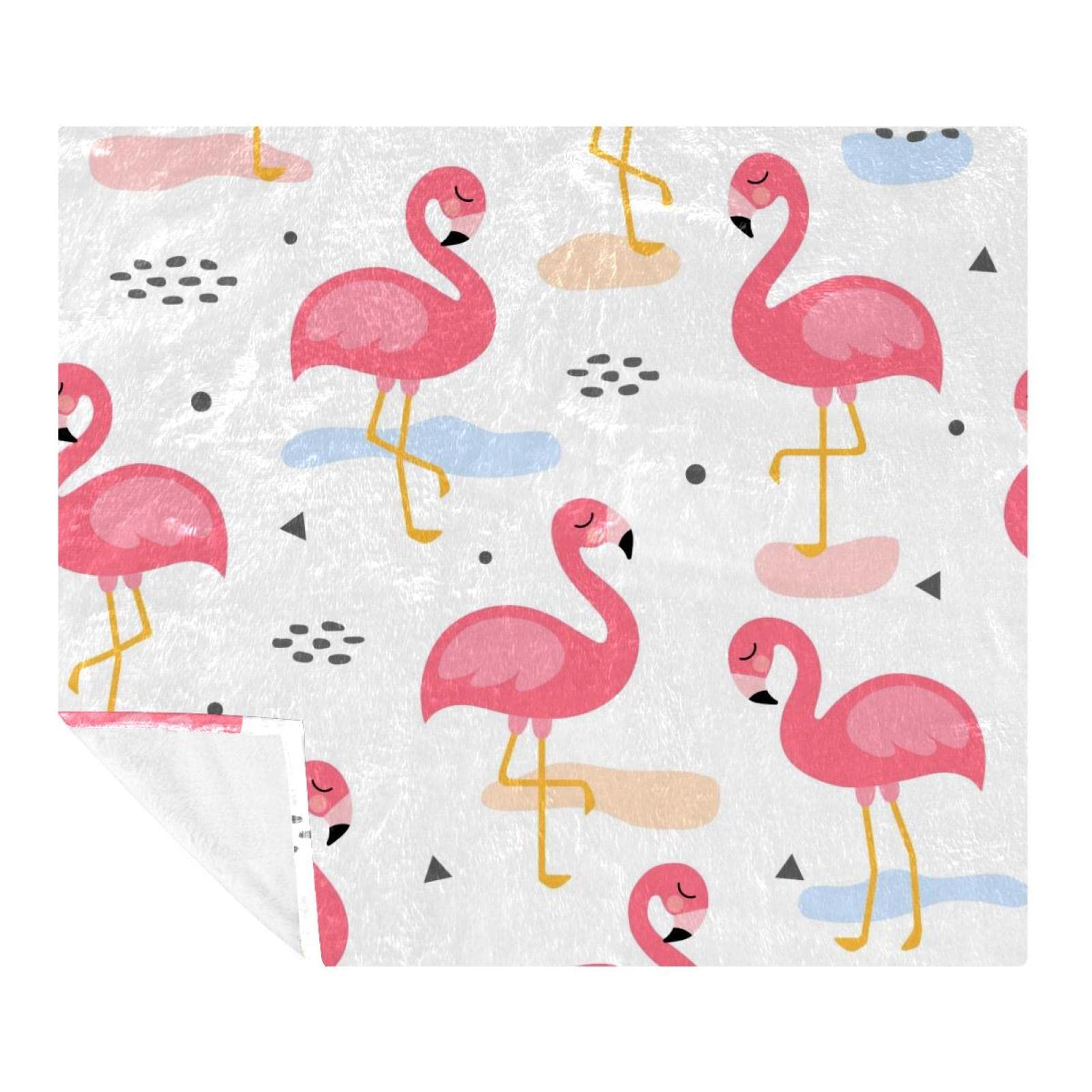 Couverture polaire chaude flamant rose contre le froid du lit et canapé
