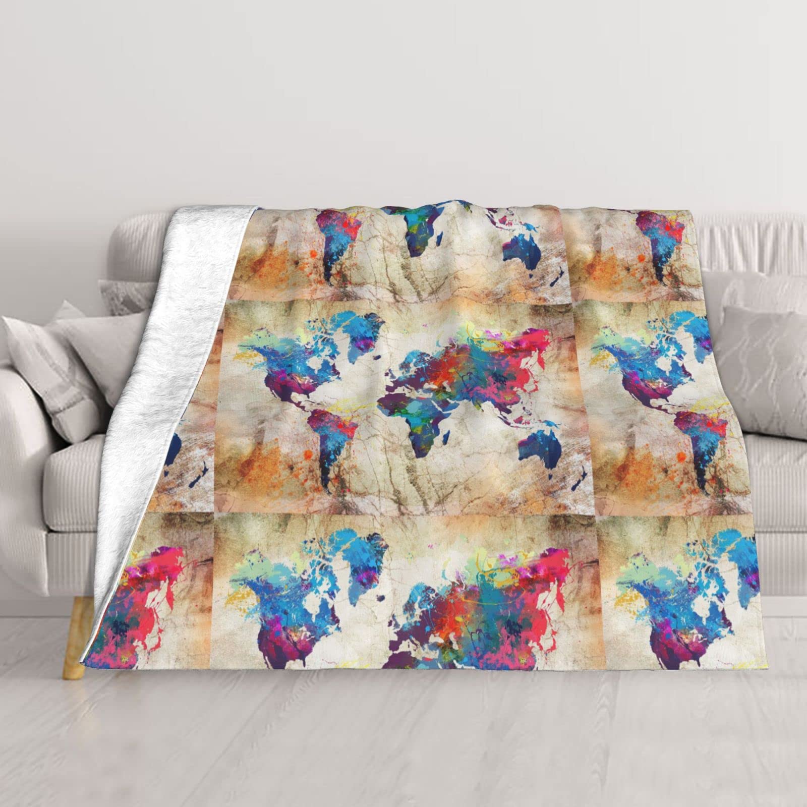 Couverture carte du monde douce contre le froid de l'hiver sur votre lit