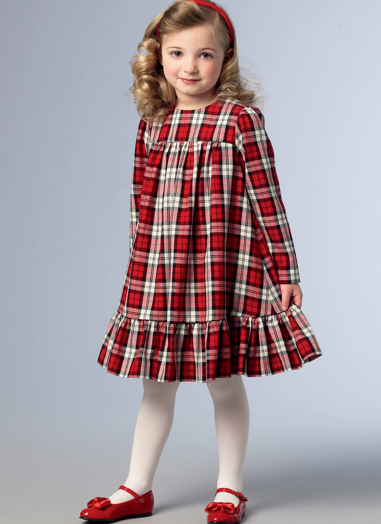 Patron robe fille Vogue V1857CDD : créez une tenue élégante pour enfant