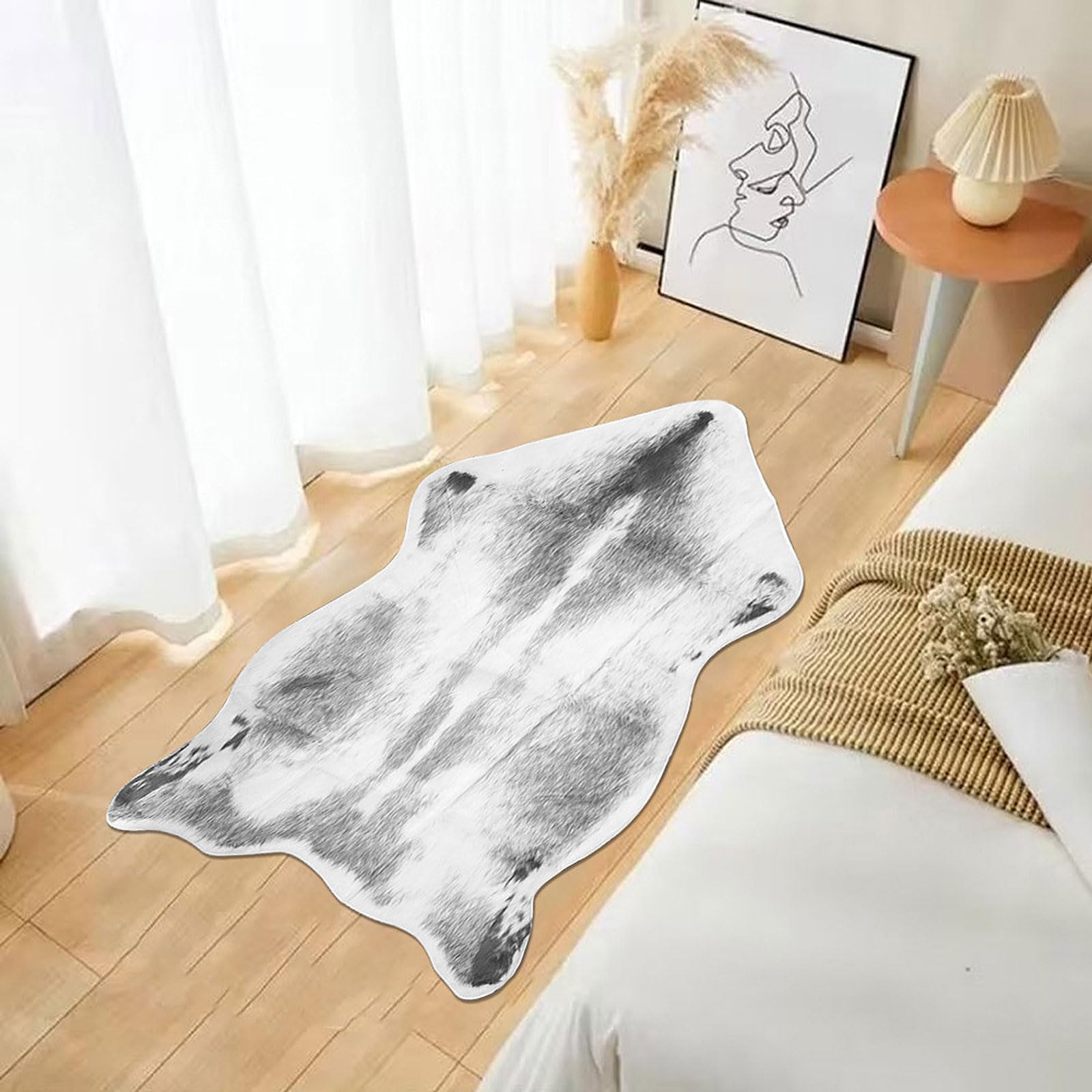Tapis peau de vache synthétique irrégulier et doux pour salon