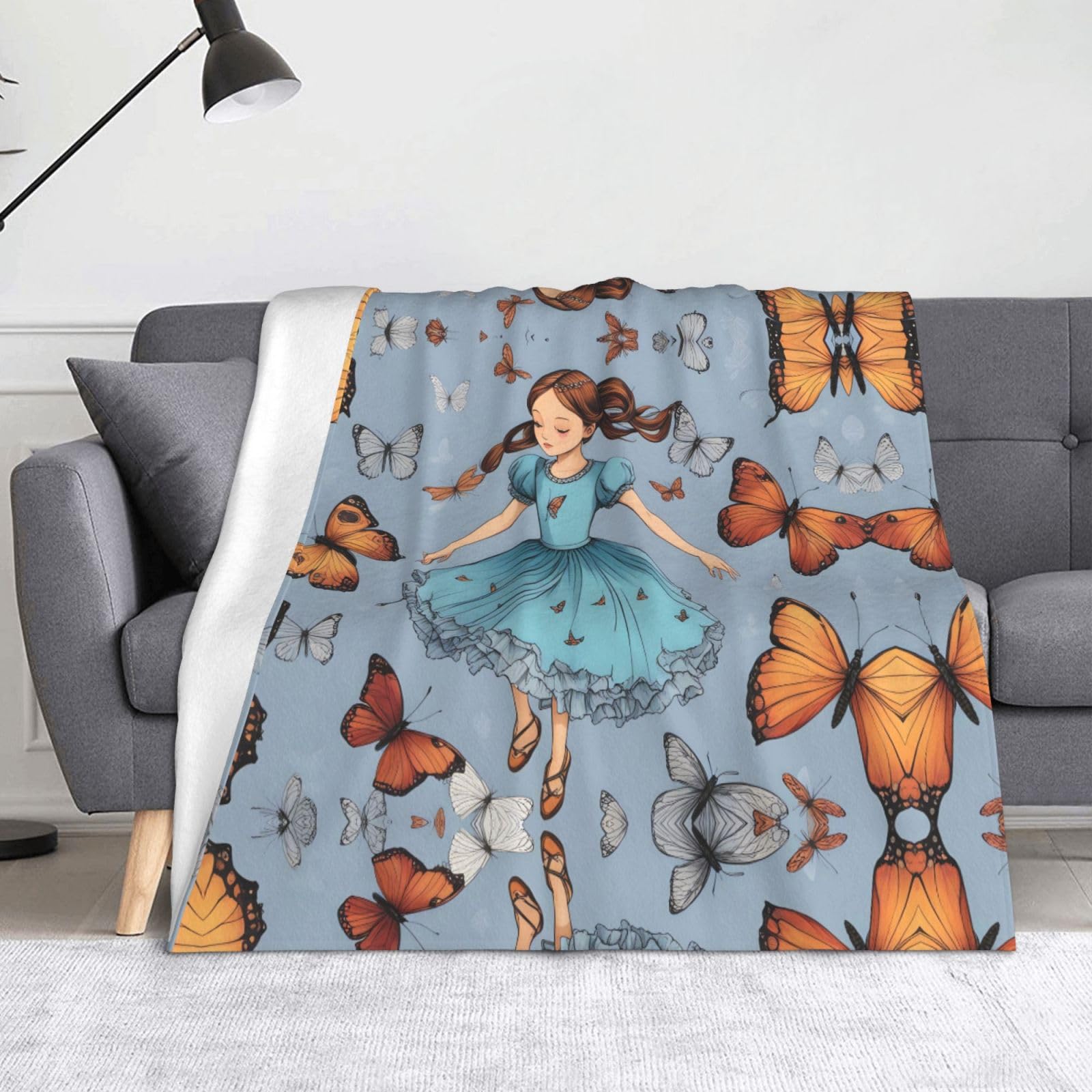 Couverture pliable BROLEO 152x127 cm pour lit et canapé avec motif dansant