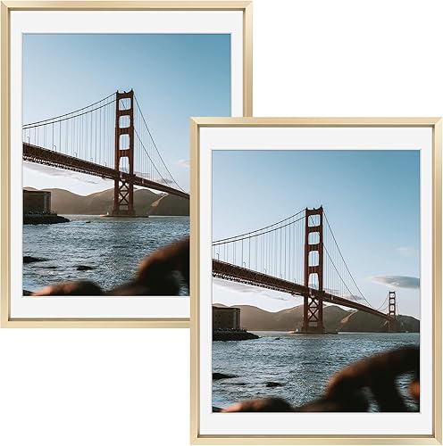 Vista 57 de Frametory - Colección de marcos de metal para fotos, marco de aluminio para fotos con alfombrilla de color marfil y cristal real Dorado