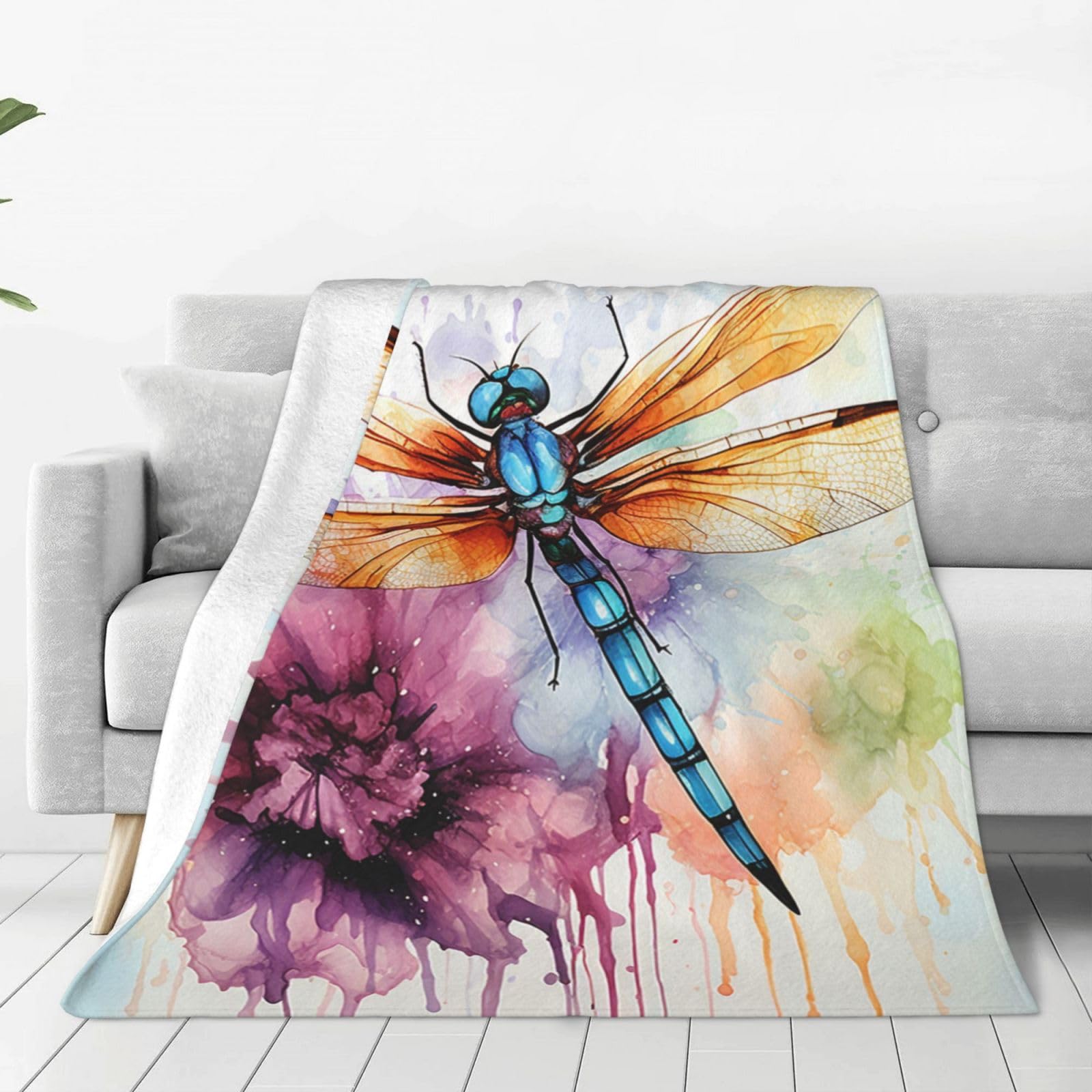 Couverture en peluche légère libellule pour vos soirées au salon