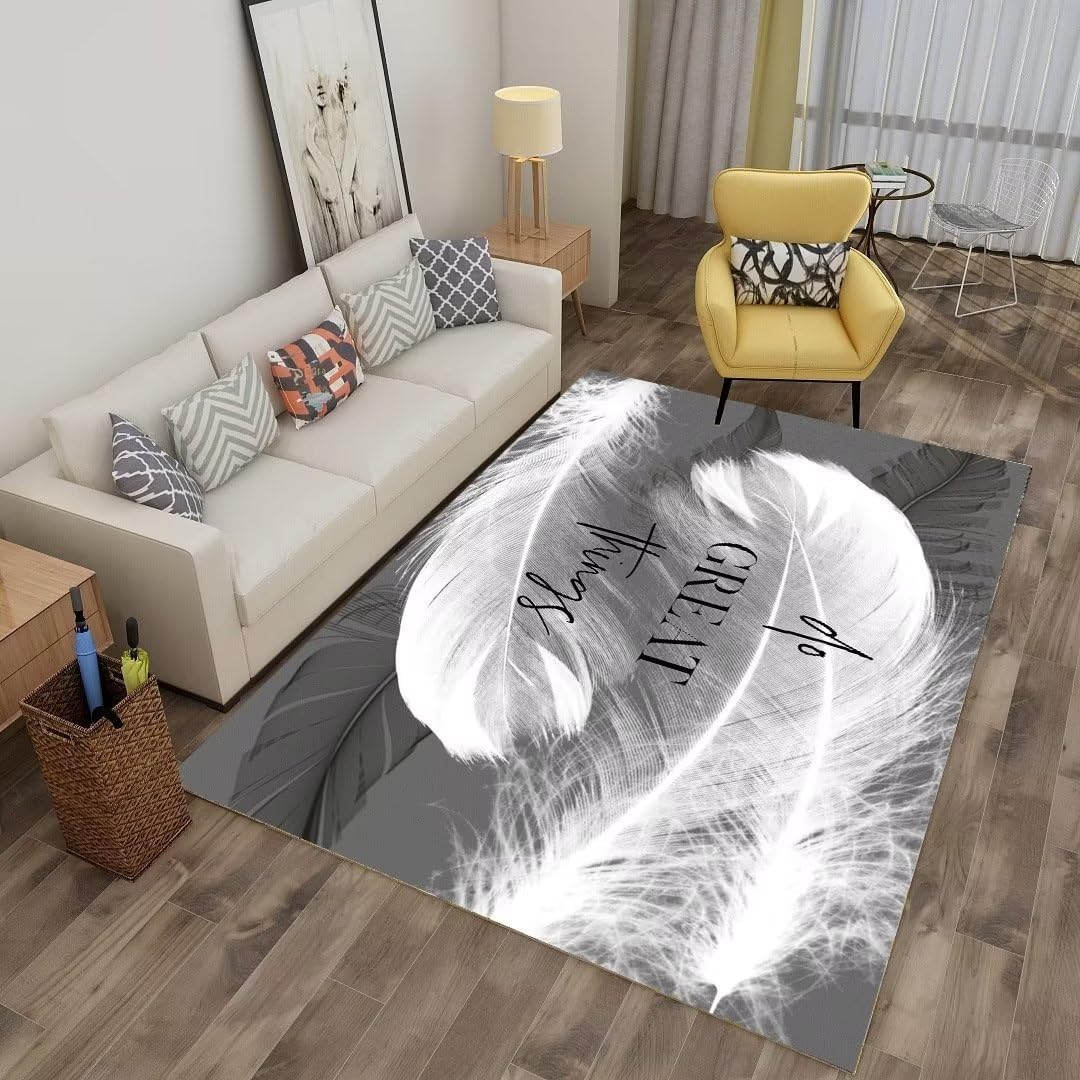 Tapis salon gris moderne au design abstrait de grandes plumes