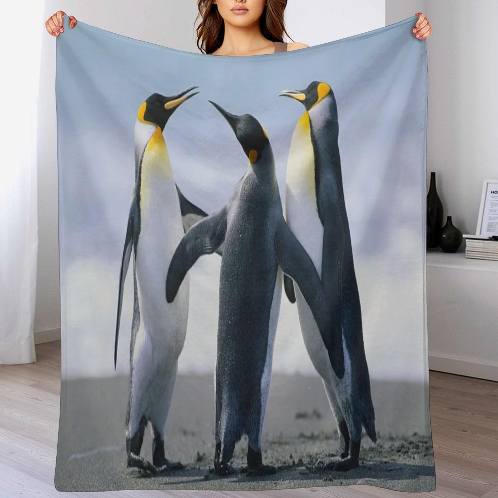 Pingouin couverture chaude et confortable contre le froid sur votre divan
