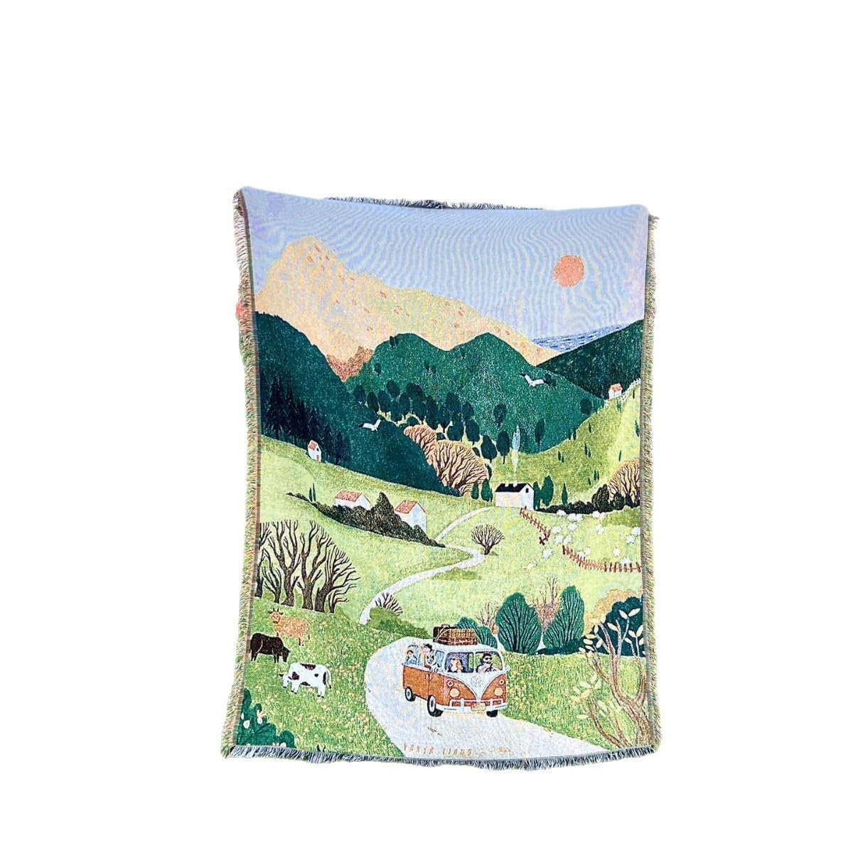 Manta tipo tapiz de jungla reversible para decorar el sofa en tardes de lectura en el salon