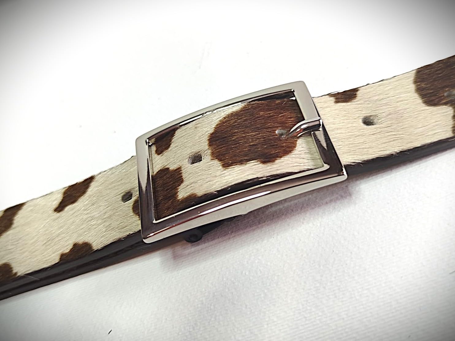 Cintura in vera pelle cavallino maculata leopardata zebrata patchwork accorciabile senza viti. confezione in cartone eco e sacchetto cotone. Made in Italy.