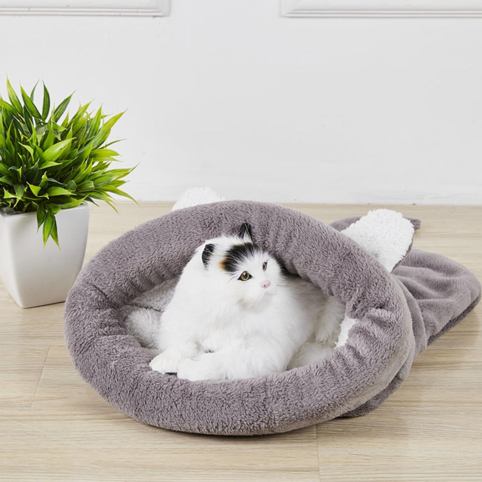Overdekte huisjes en slaapzakken voor katten