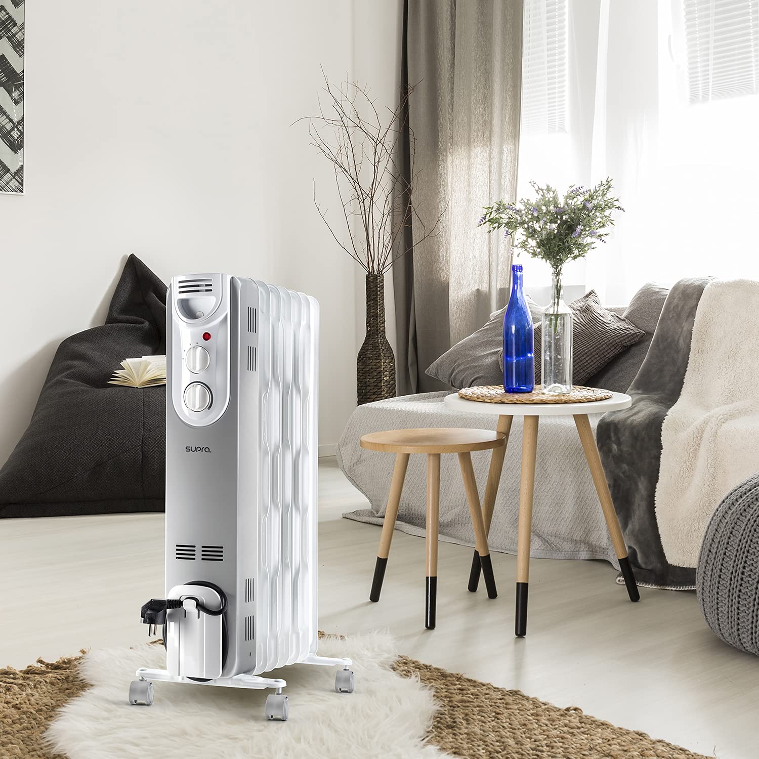 SUPRA ORSO 1500 - Radiador de aceite de 1500W, 3 potencias, hasta 15m2, recoge-cables, ruedas, asa transporte, antivuelco, termostato mecánico, indicador luminoso de funcionamiento,blanco