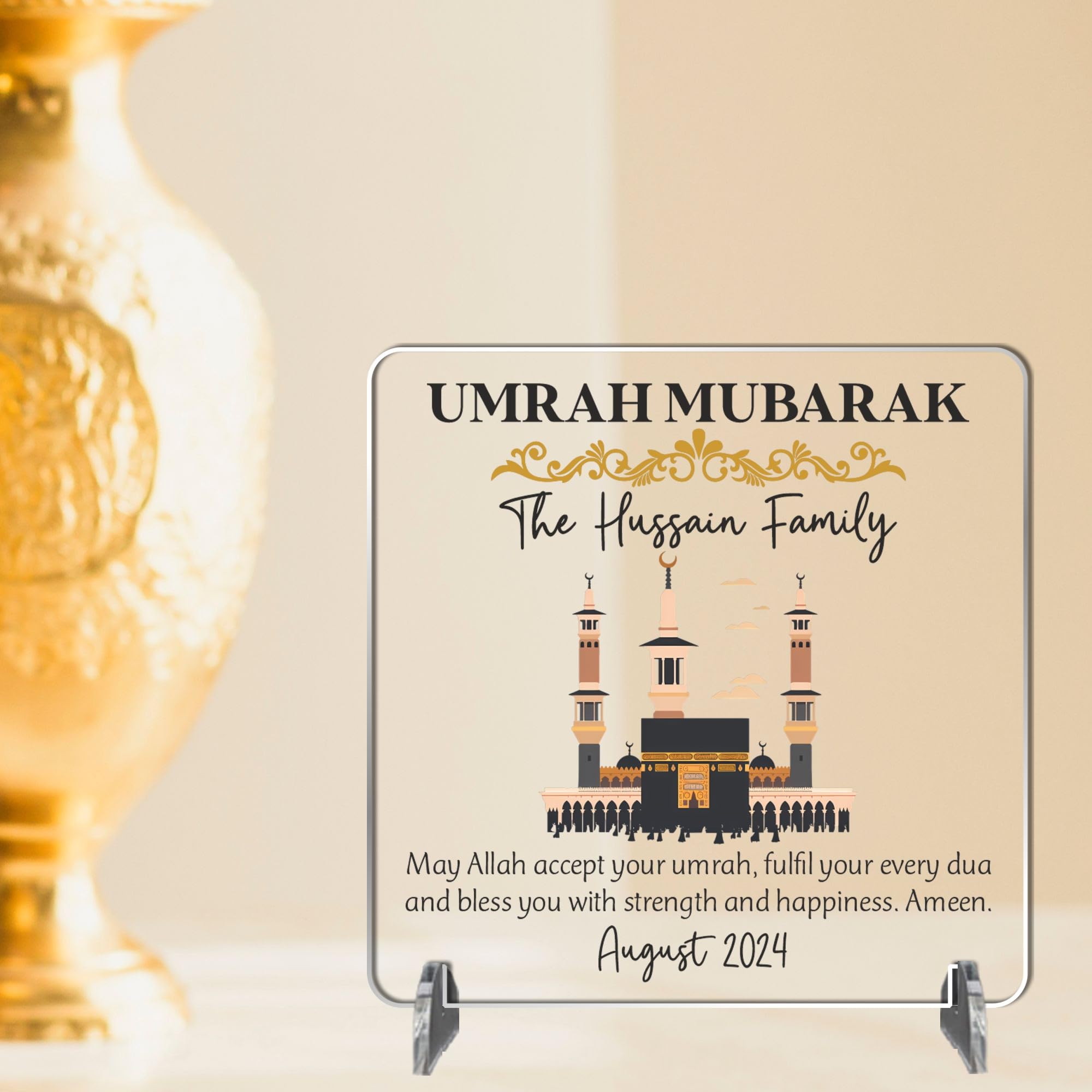 Personalised Umrah Mubarak Plaque – Kaaba and Floral Design, Custom Names, Arabic Calligraphy Keepsake, Square 9.5cm Plaque for Umrah Celebrations (Black & Gold, Acrylic (Indoor & outdoor use))