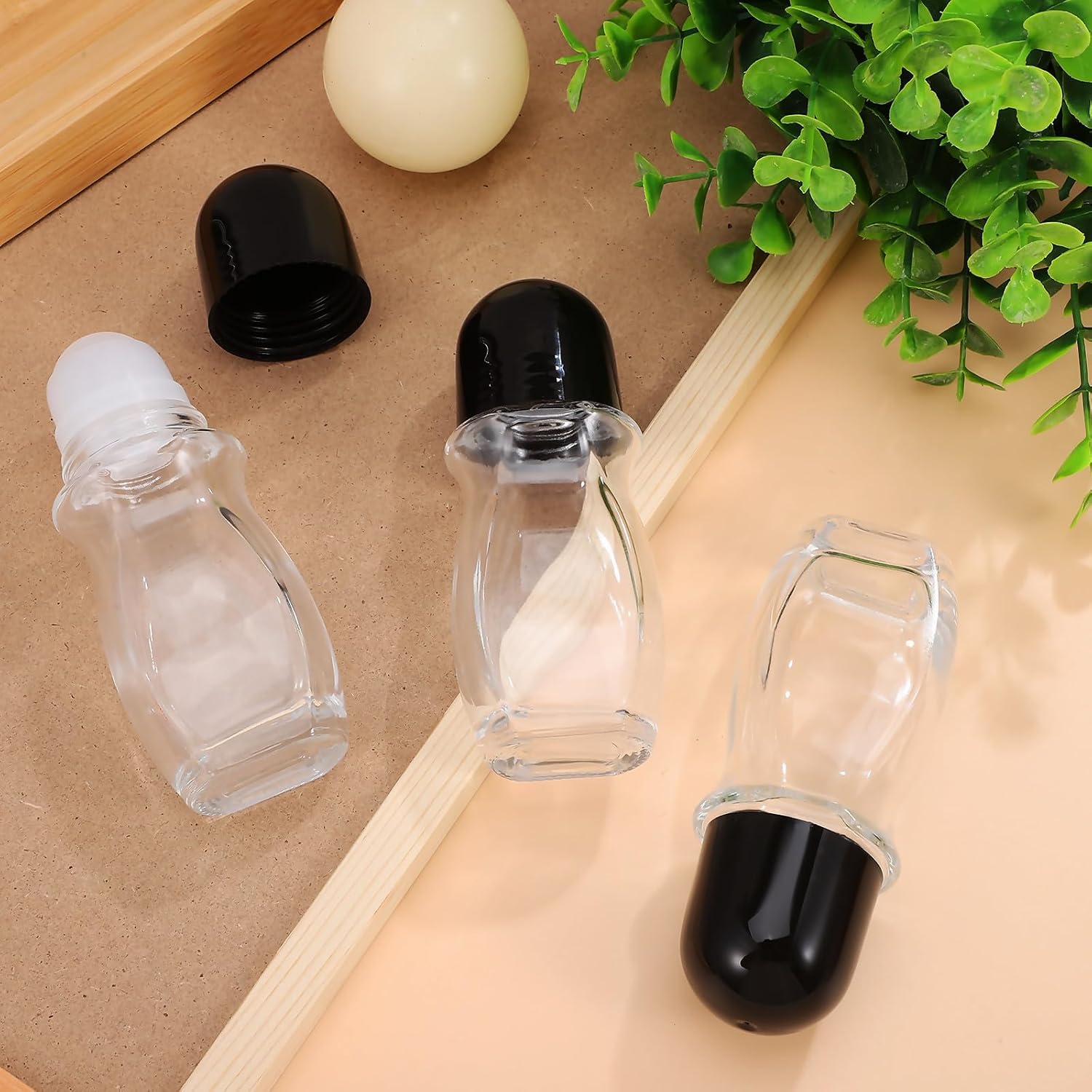 Cabilock 4 Pcs Glass Empty Roller Ball Bottles for Essential Oils with Roll-on Design and Leakproof Seal, 50ml Capacity Travel Carry Bottles for Perfume and Massage