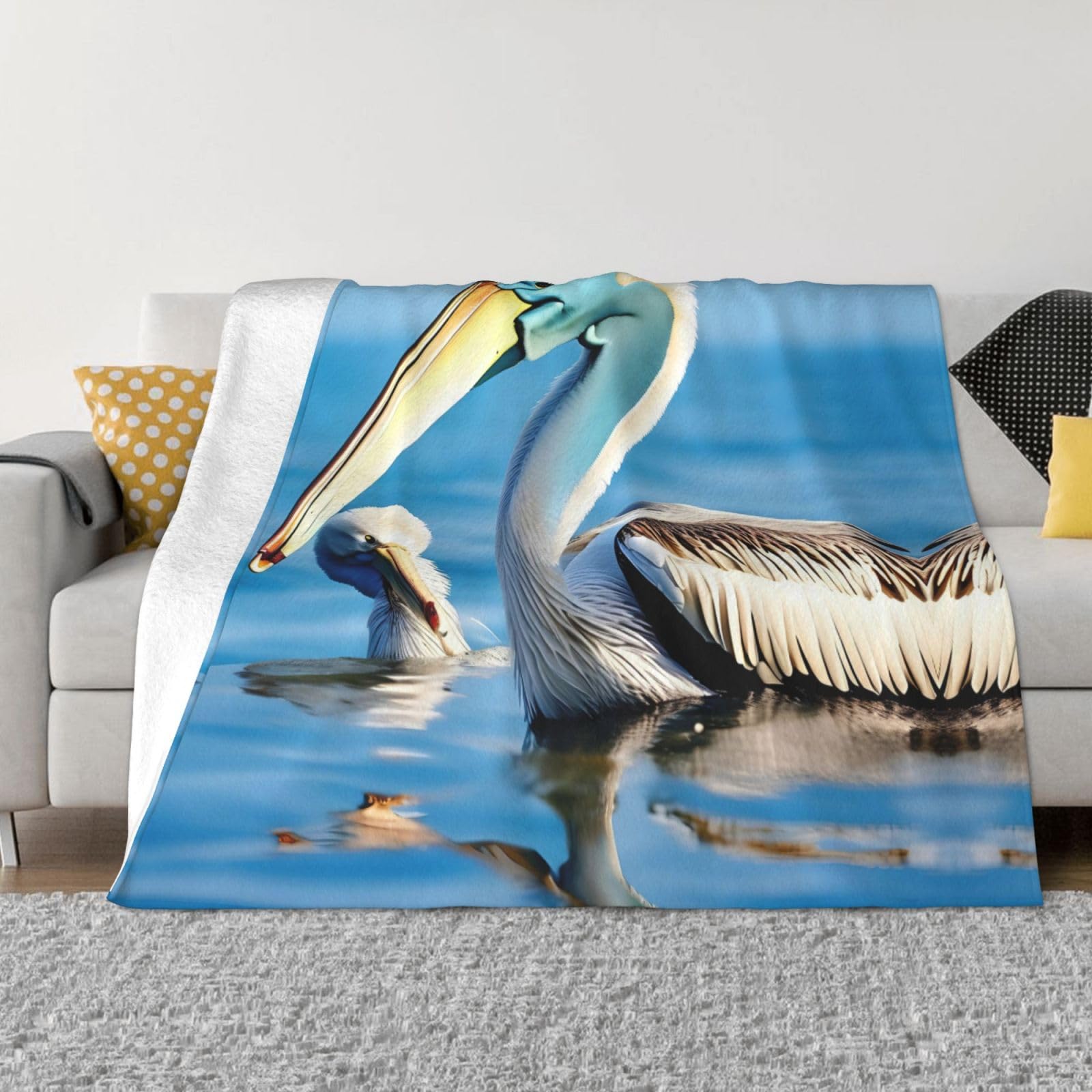 Couverture polaire flanelle pélican pour vos soirées cocooning au salon