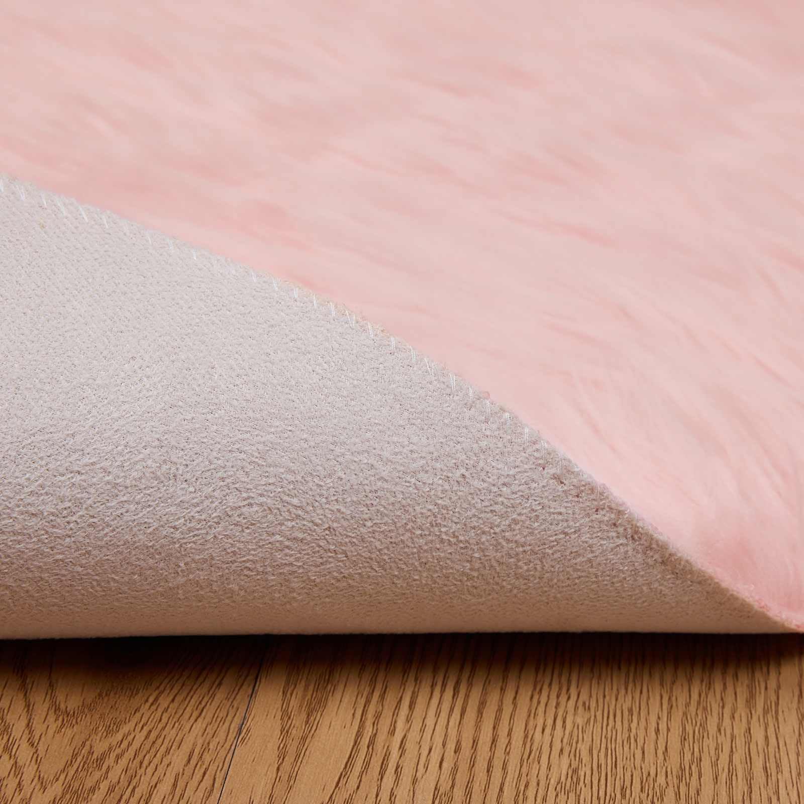 Tapis rond en fausse fourrure - Ø 100 cm - Rose - Imitation peau de mouton douce comme tapis de salon à poils longs - Tapis décoratif douillet en polyester pour intérieur confortable et