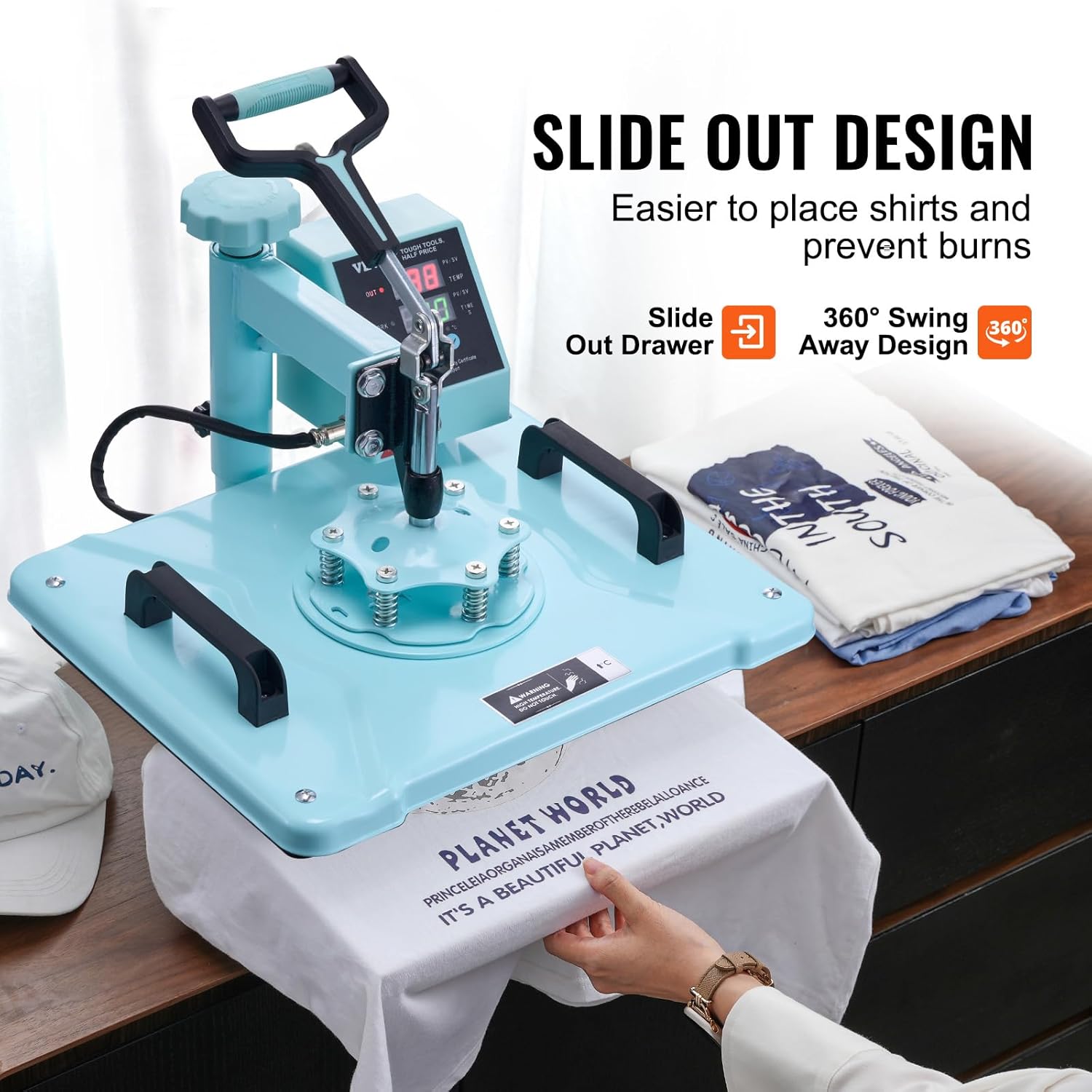 A user demonstrating the slide-out drawer and 360-degree swing-away feature of the heat press for safe T-shirt placement.