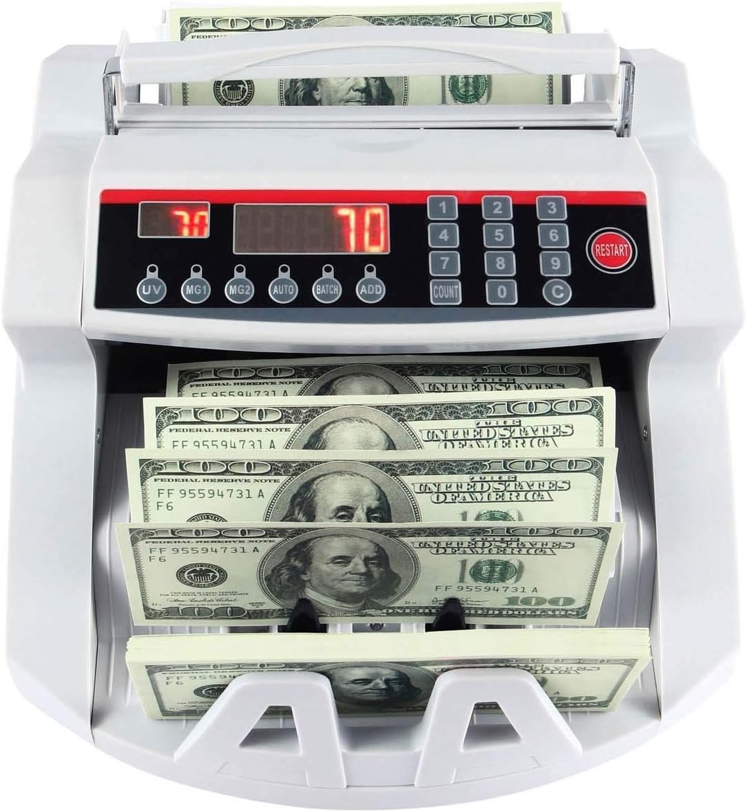Front view of the TOMATE MYC-03 Money Counter with banknotes loaded in the hopper and stacked below.