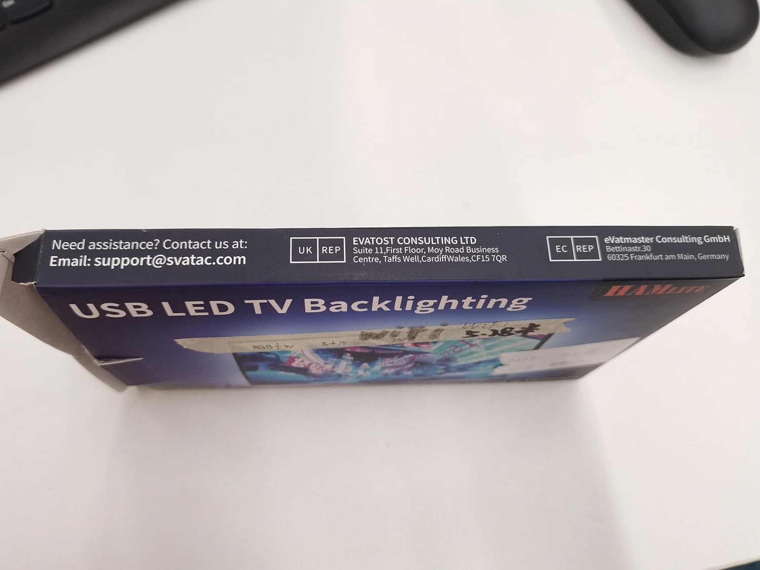 USB cable connected to a TV's USB port