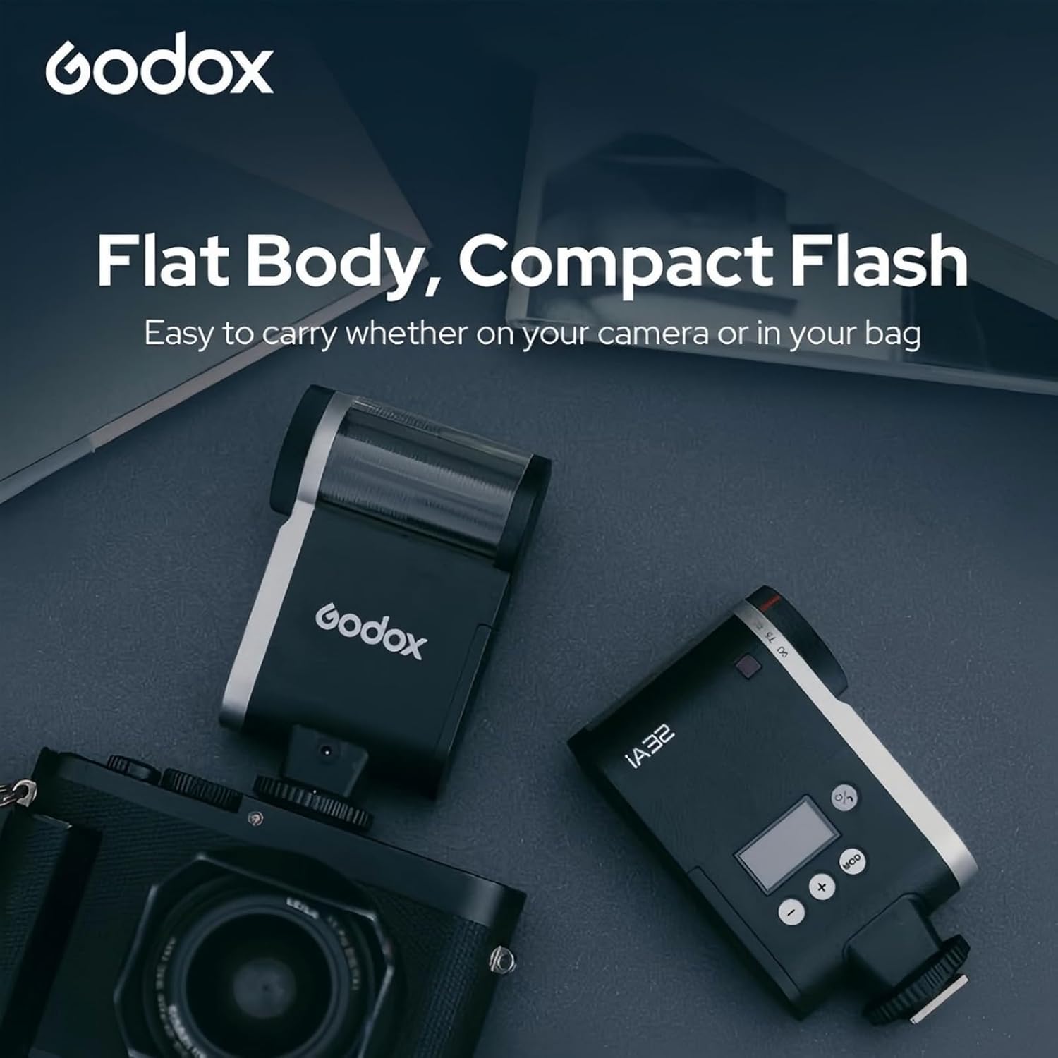 Close-up of Godox iA32 flash display showing Auto and Manual mode settings