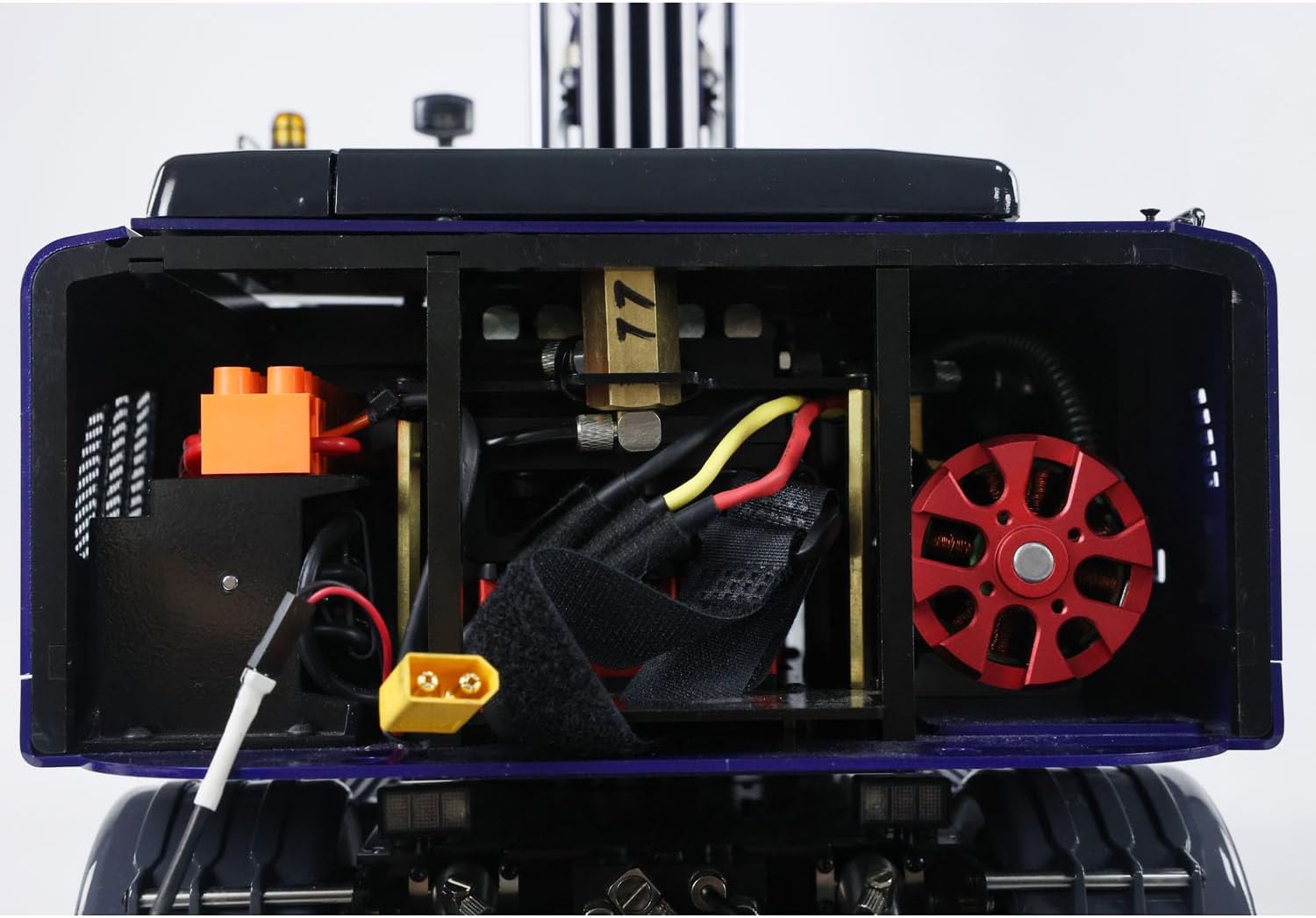 Indre view of the wheelfun R946 excavator showing battery compartment and electronics