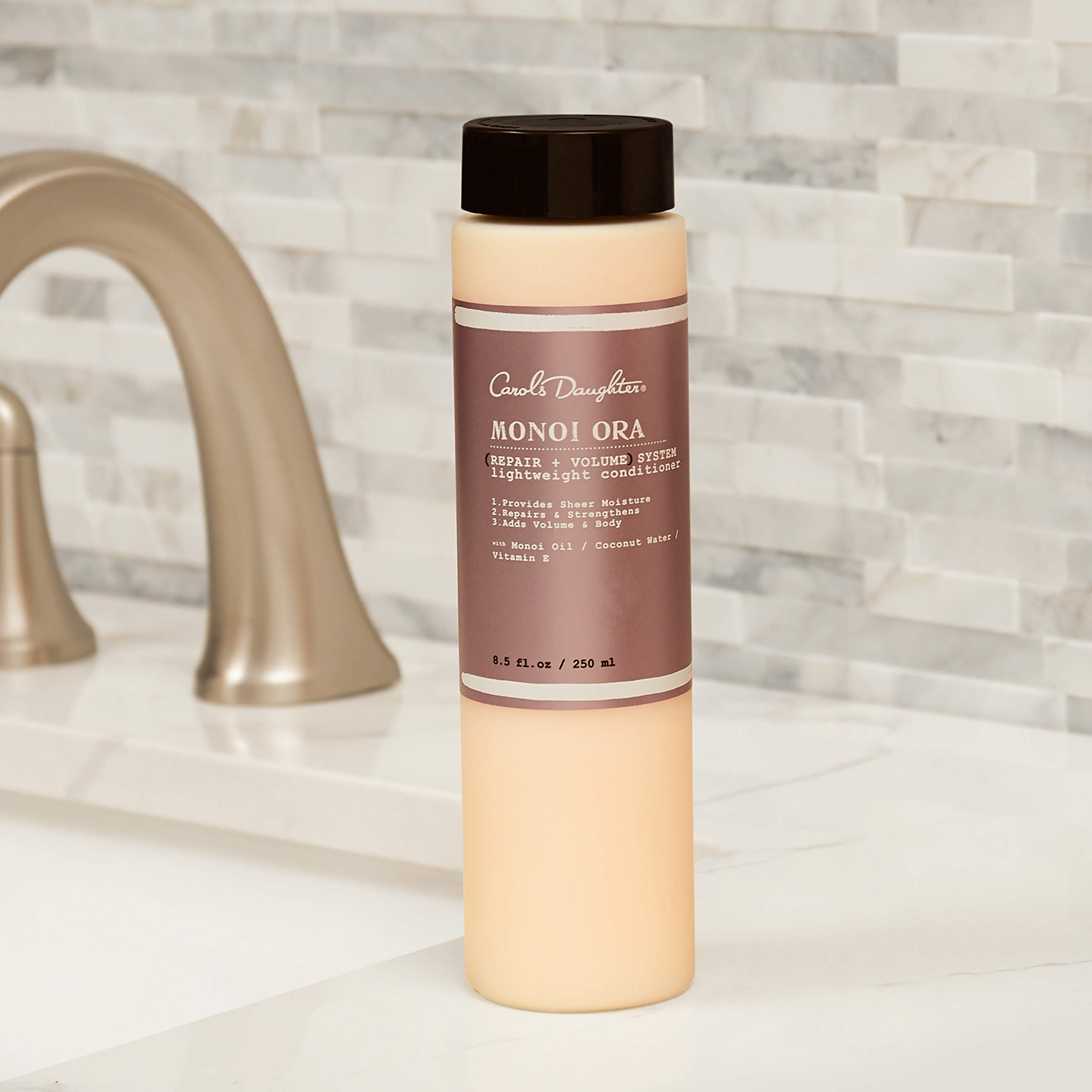 Carol S DAUGHTER Monoi Ora + volume système Lightweight Après-shampoing réparateur 250 ml